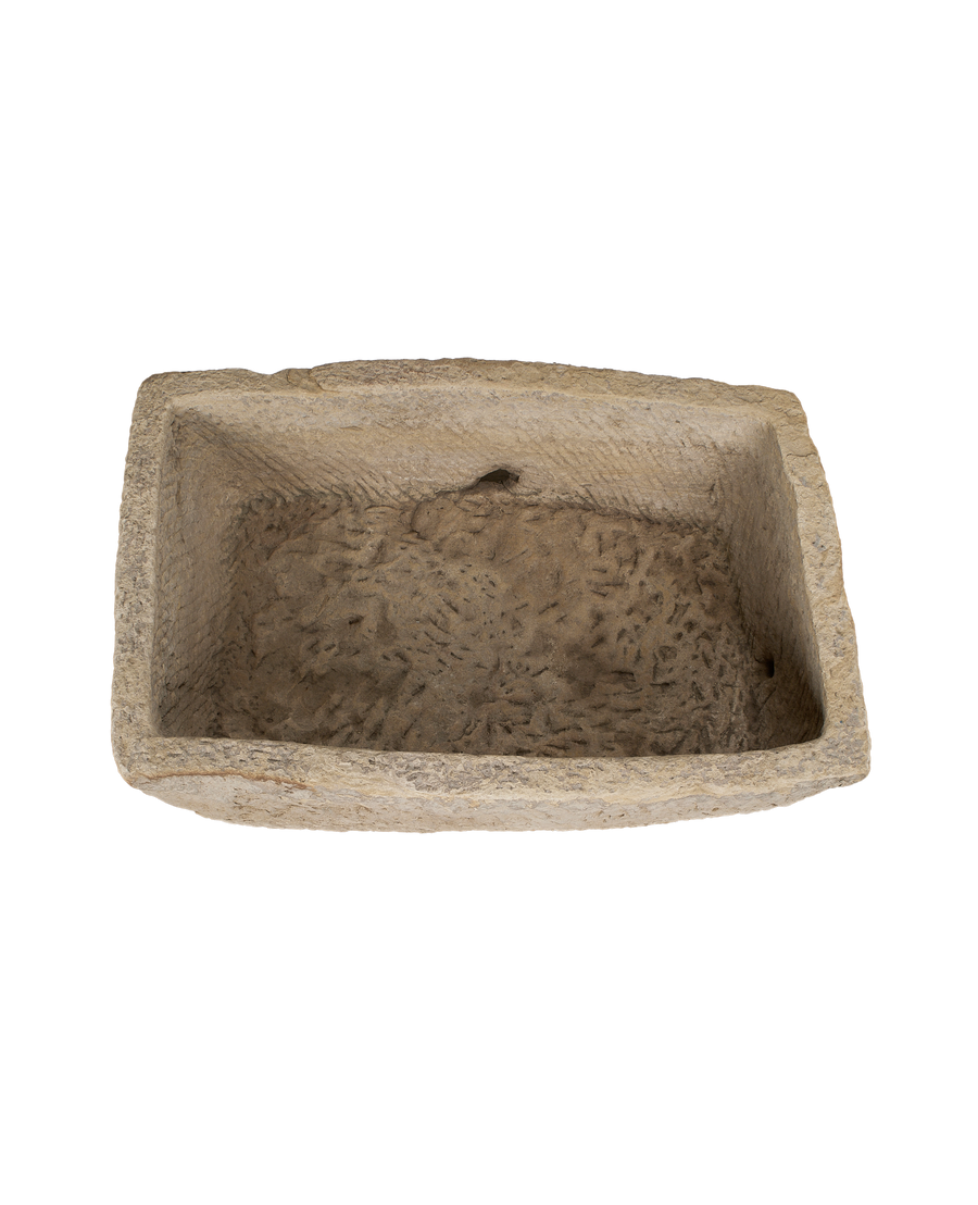 Vintage Indian OAK stone trough: overhead view showing rough textured interior and drainage hole.