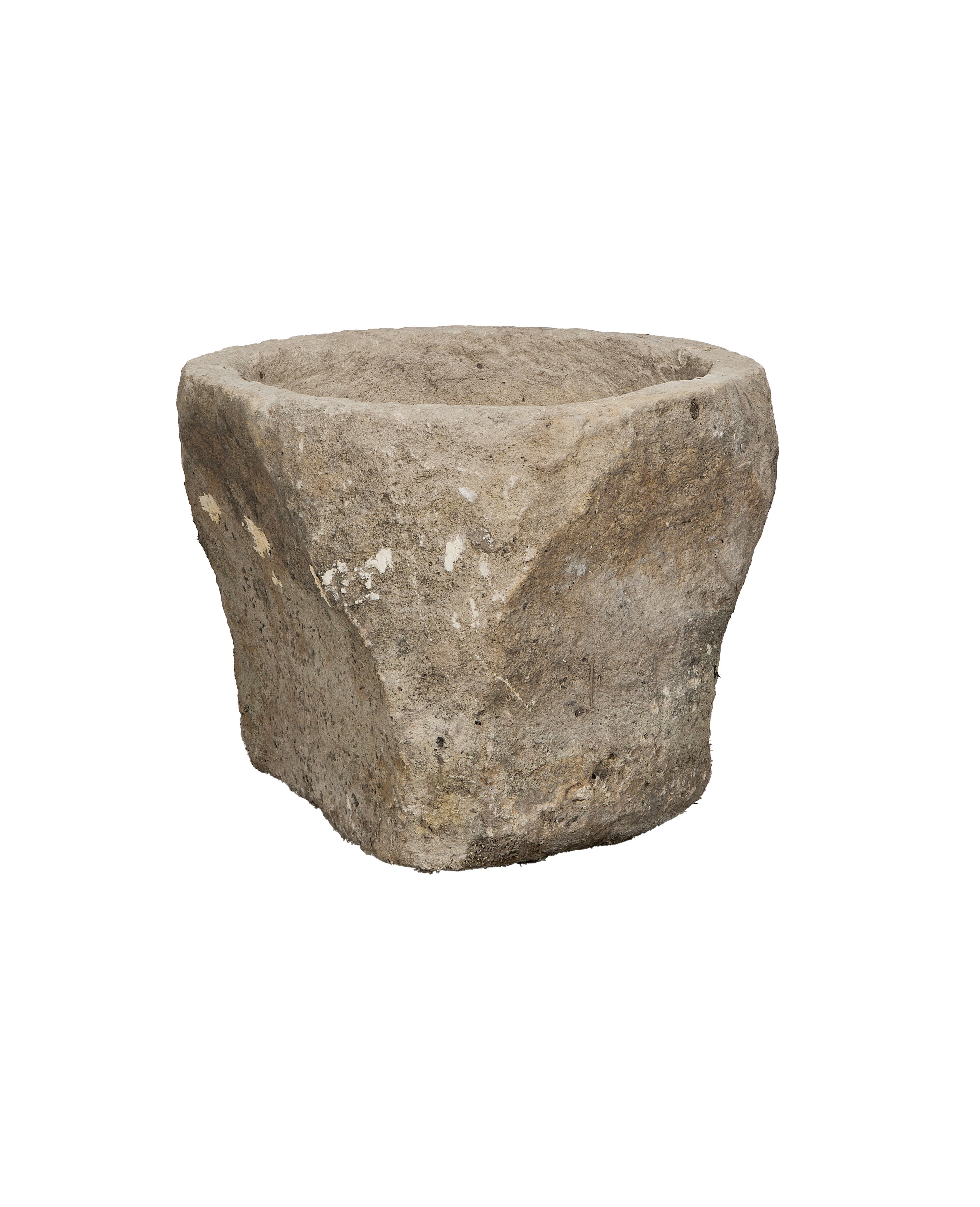 Vintage Indonesian round limestone trough, showing weathered texture and unique organic shape.