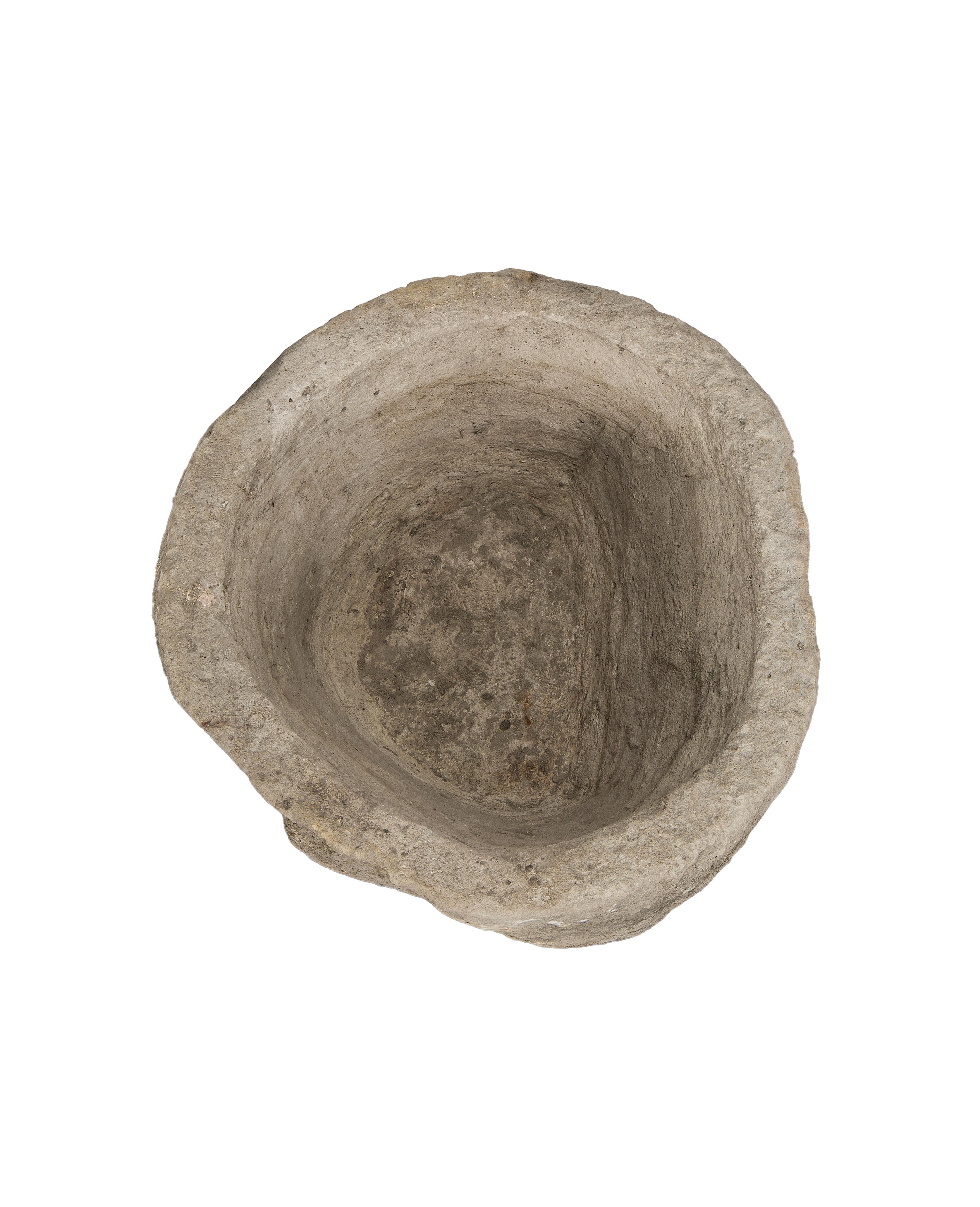 Vintage Indonesian limestone trough, top-down view showing deep, weathered interior texture.