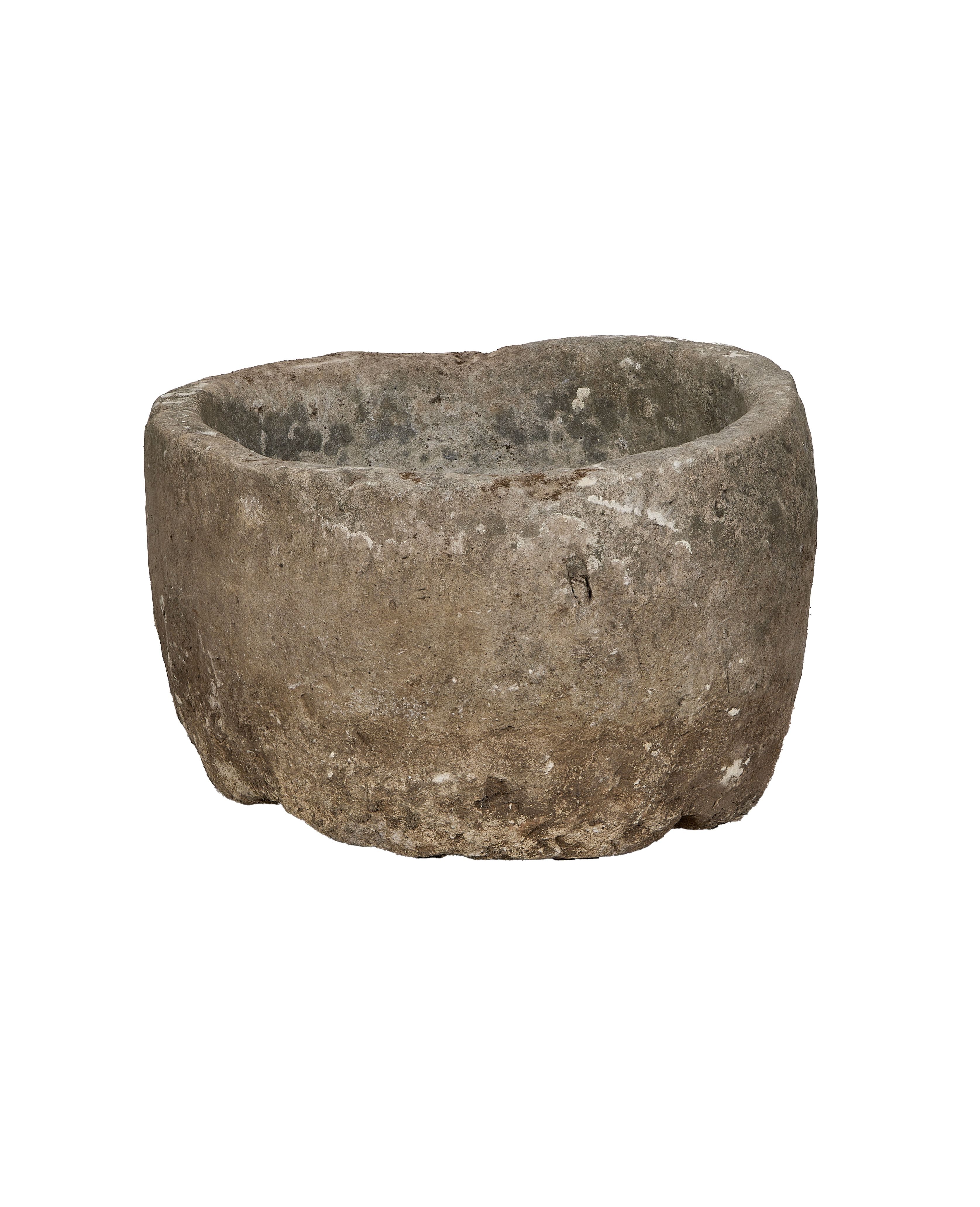 Vintage round Indonesian limestone trough, showing rough exterior texture and chipped rim.