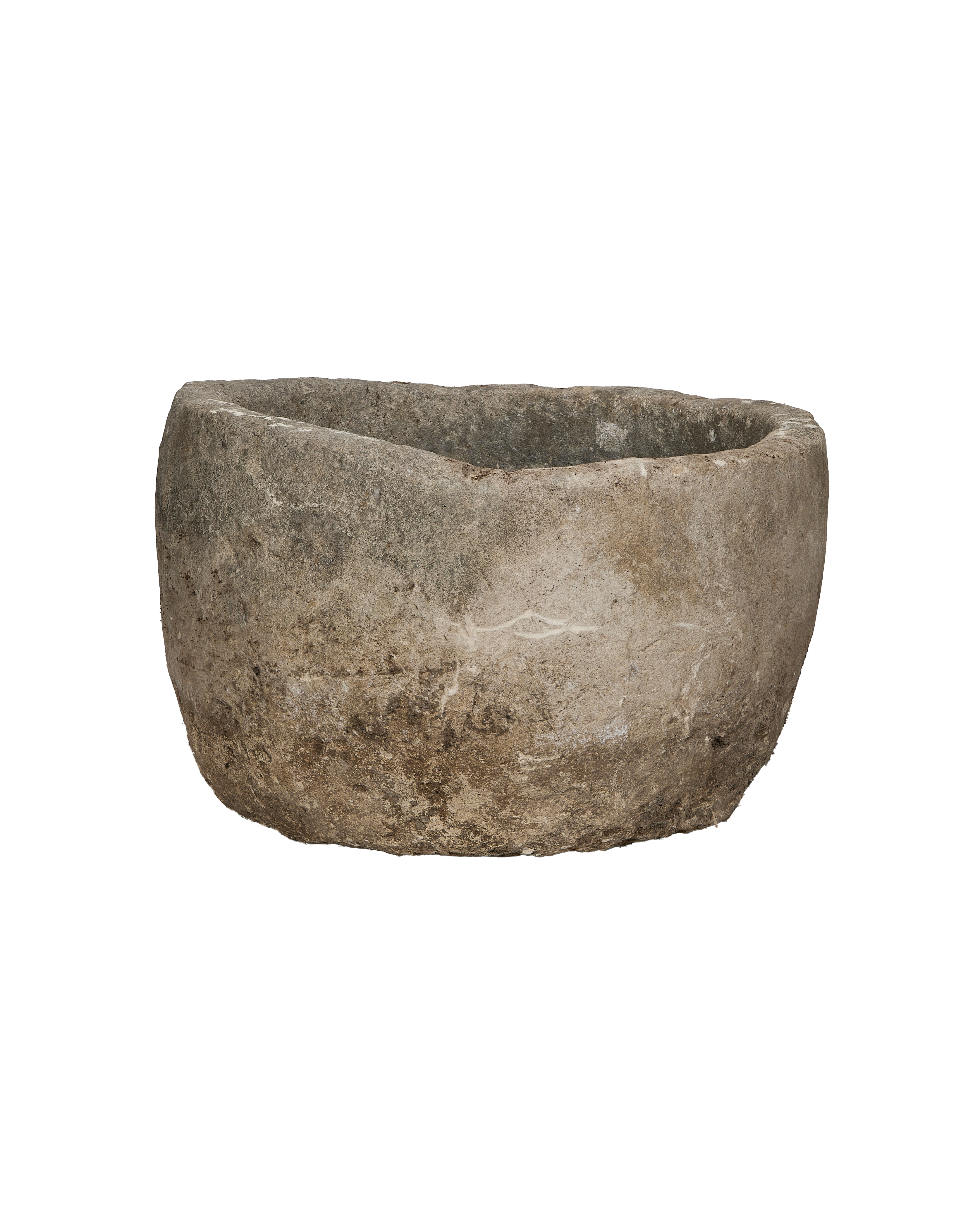 Round vintage Indonesian limestone trough, showing weathered texture from an elevated angle.