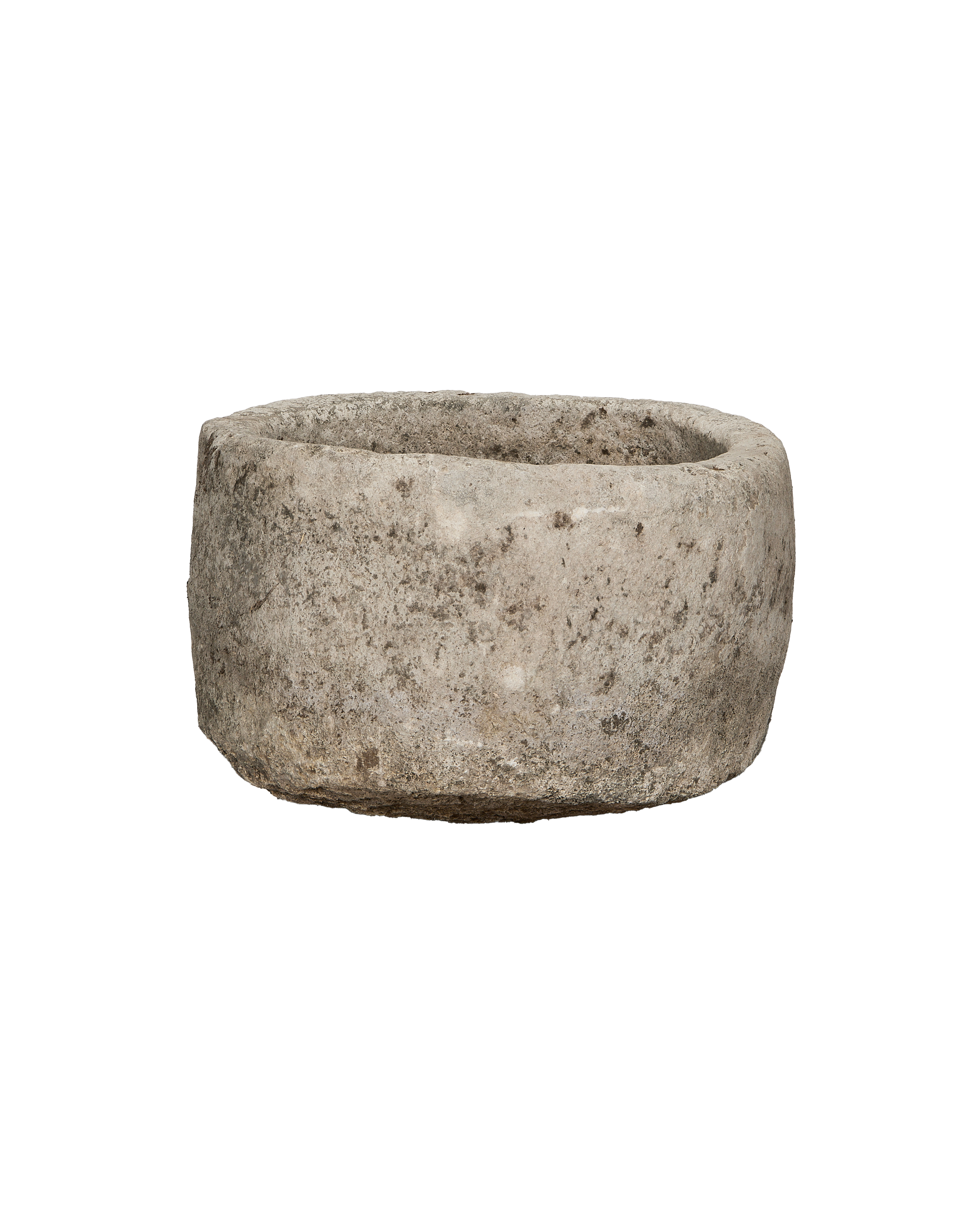 Vintage Indonesian round limestone trough, distressed texture, showcasing rough weathered surface.
