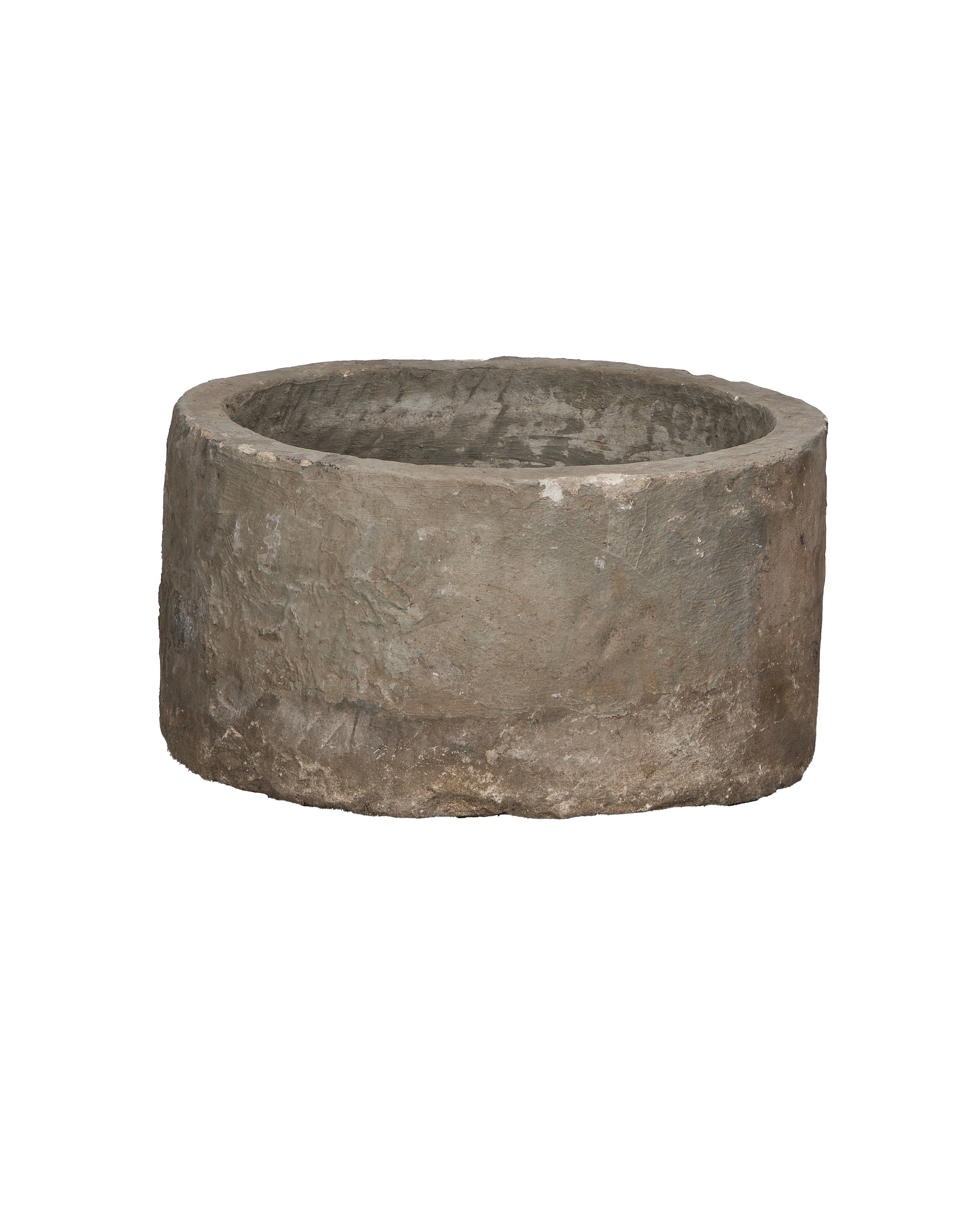 Vintage Indonesian limestone round trough from above, showing rough texture and weathered condition.