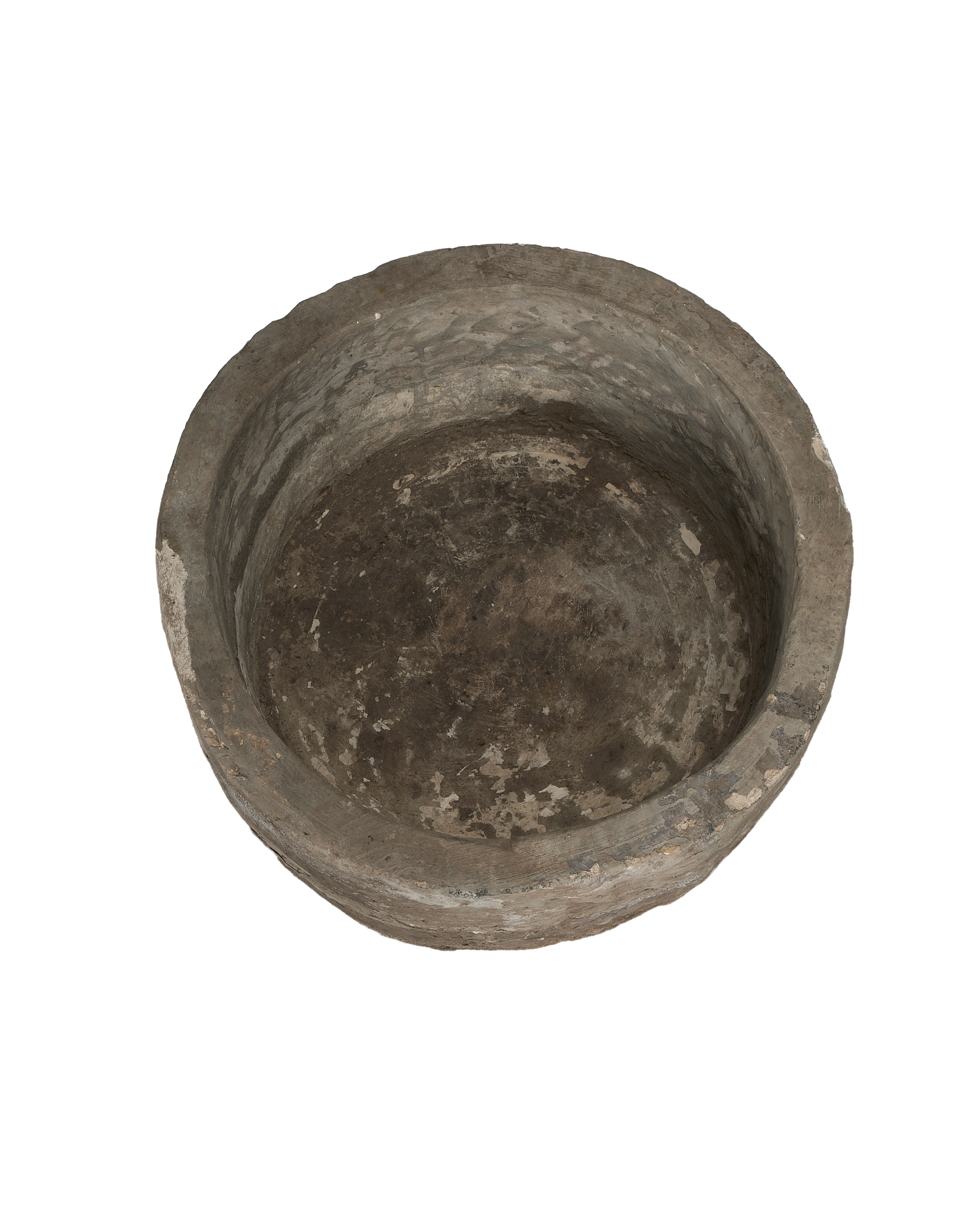 Vintage round limestone trough, full interior view, showing aged patina and unique texture.