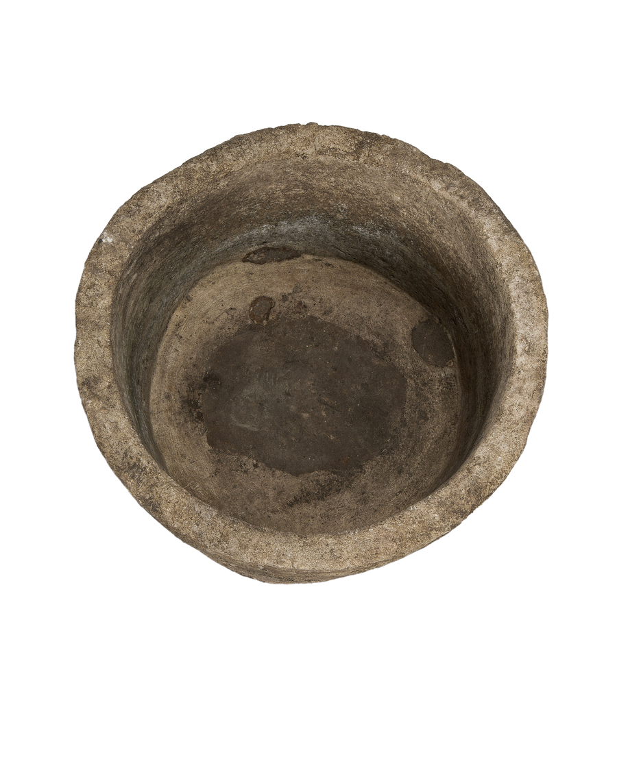 Vintage Indonesian round limestone trough with aged, weathered texture and natural imperfections.