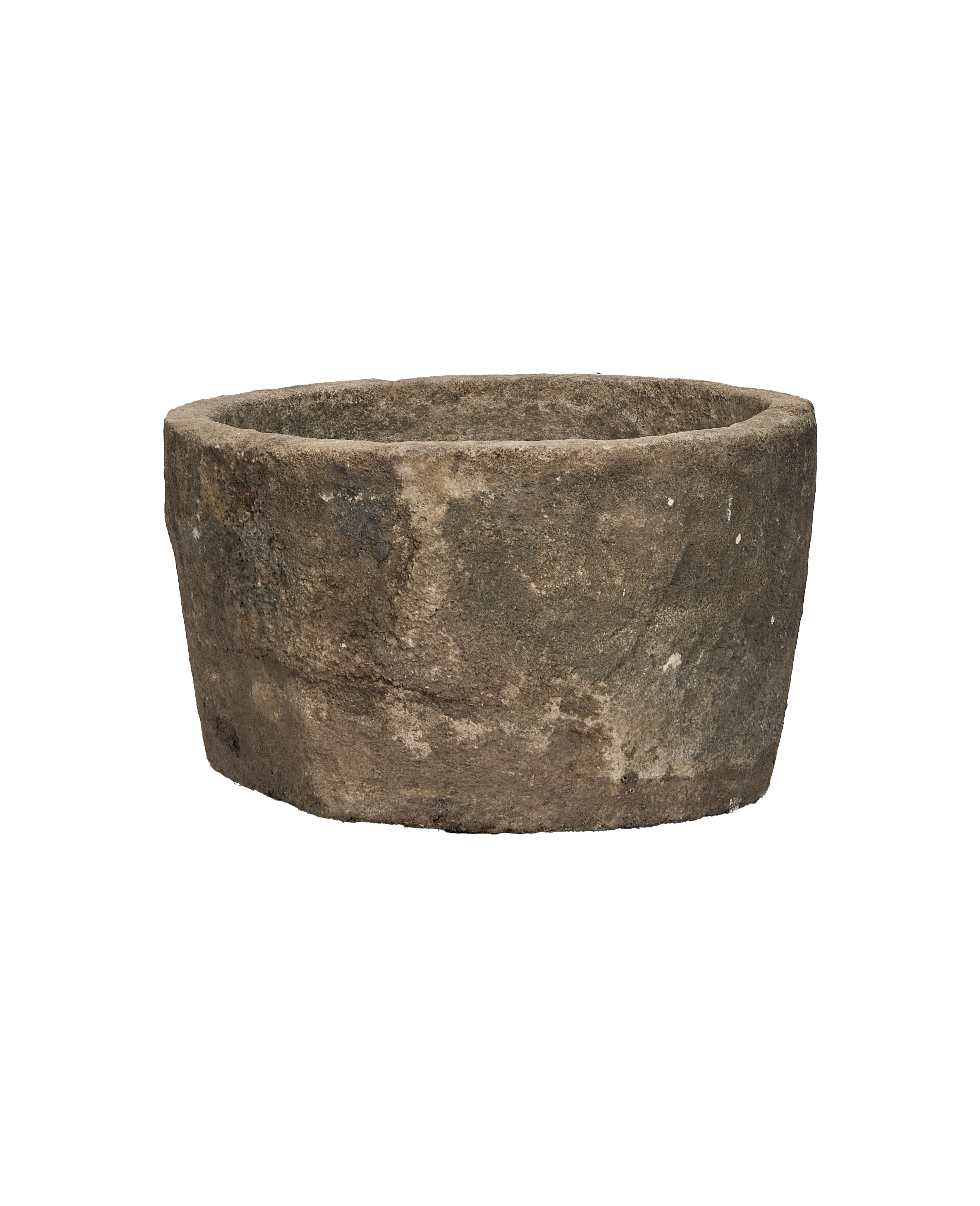 Vintage round limestone trough from Indonesia, showcasing weathered exterior texture and condition.