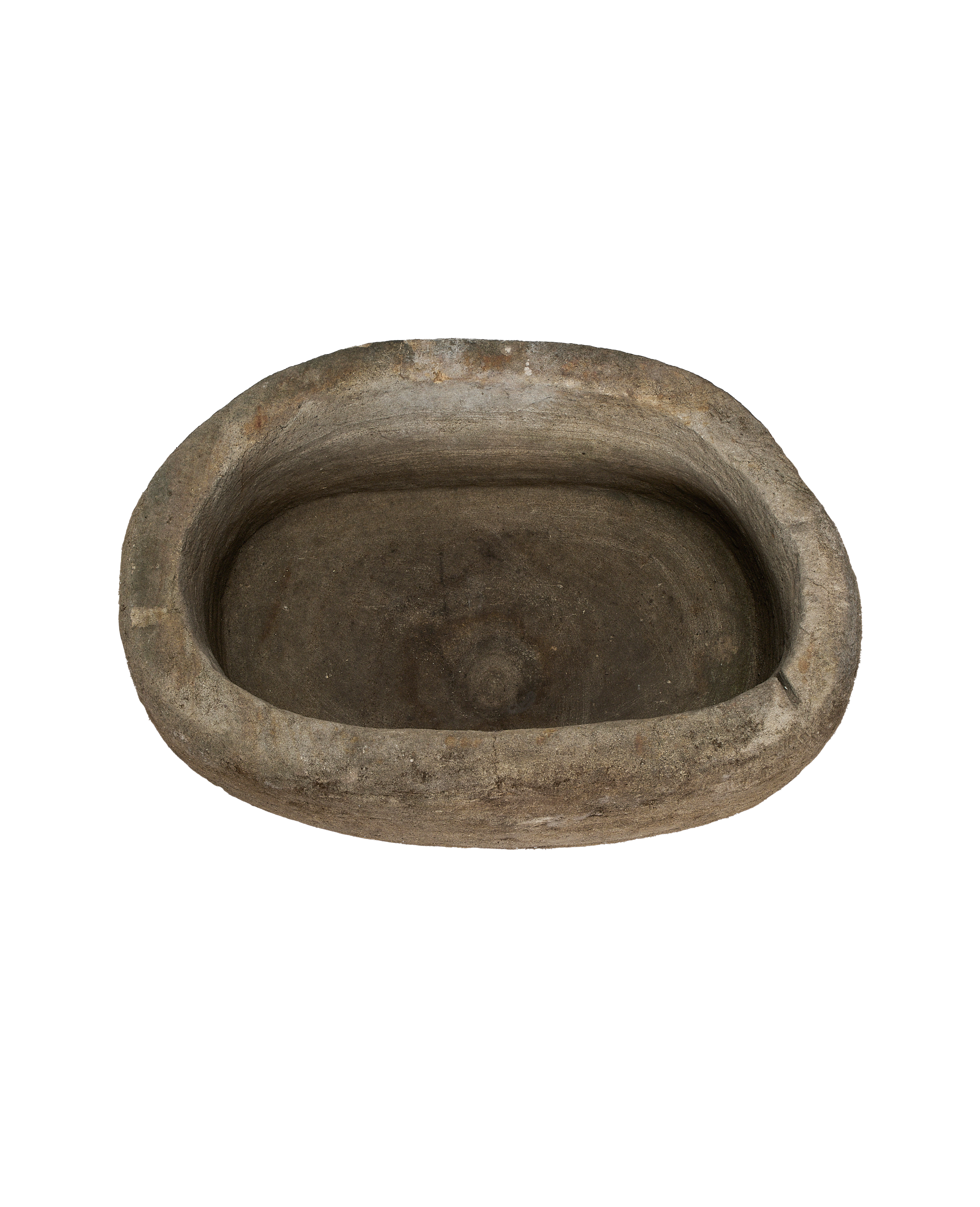 Vintage oblong limestone trough from Indonesia, interior showing texture and aged patina.
