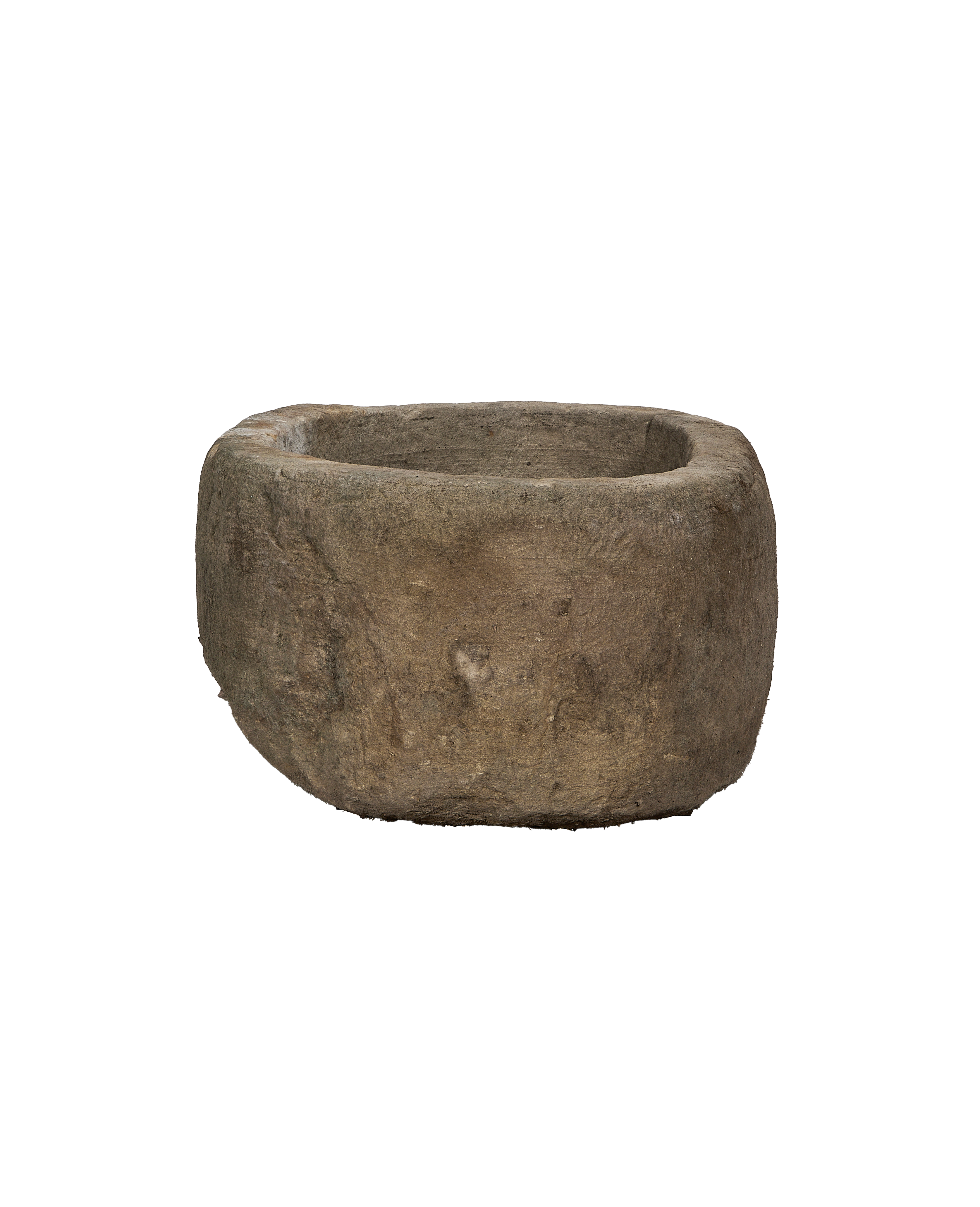 Vintage Indonesian oblong limestone trough viewed from the side, focusing on rough texture.