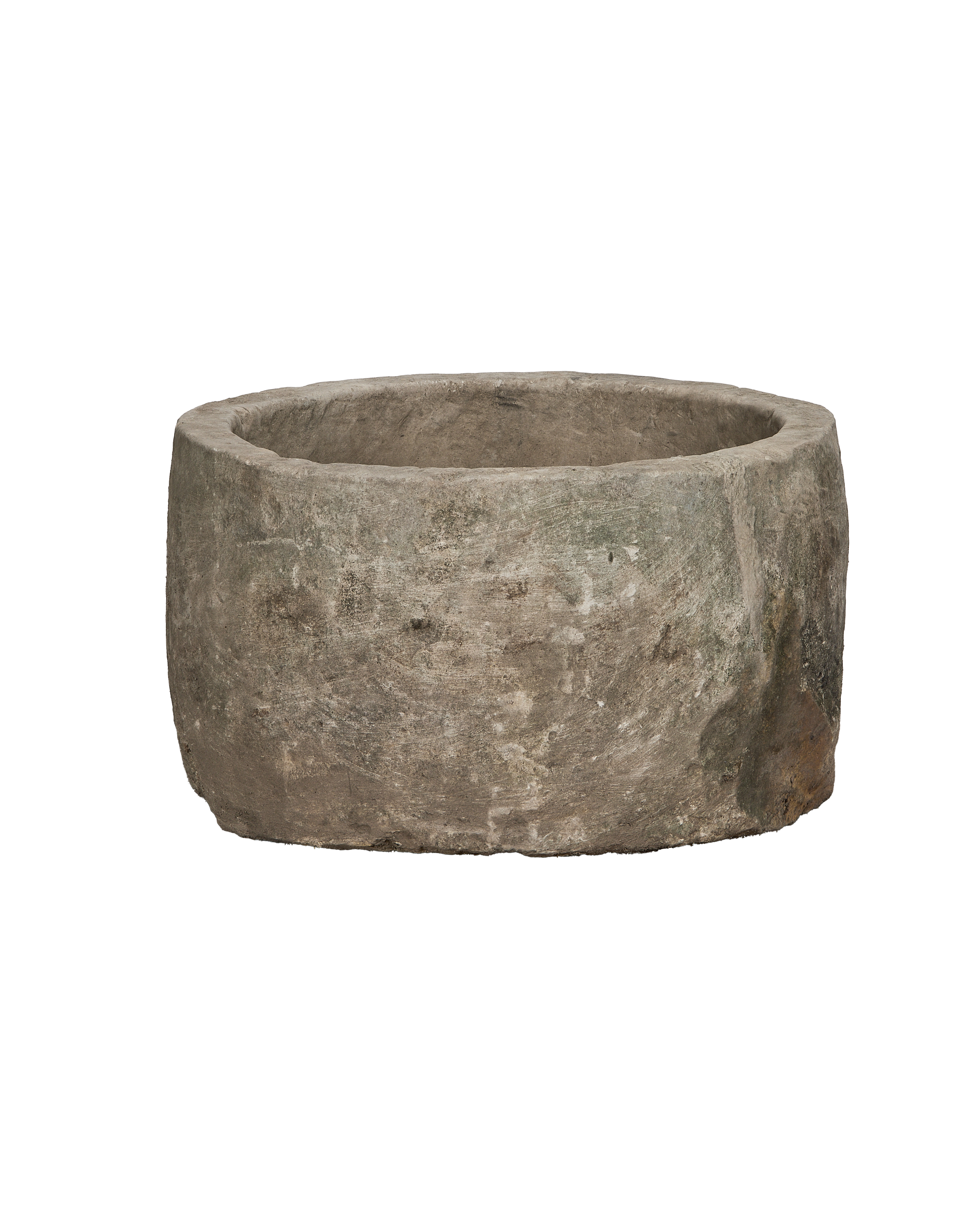 Vintage Indonesian round limestone trough, showing its rough, weathered texture and rustic patina.