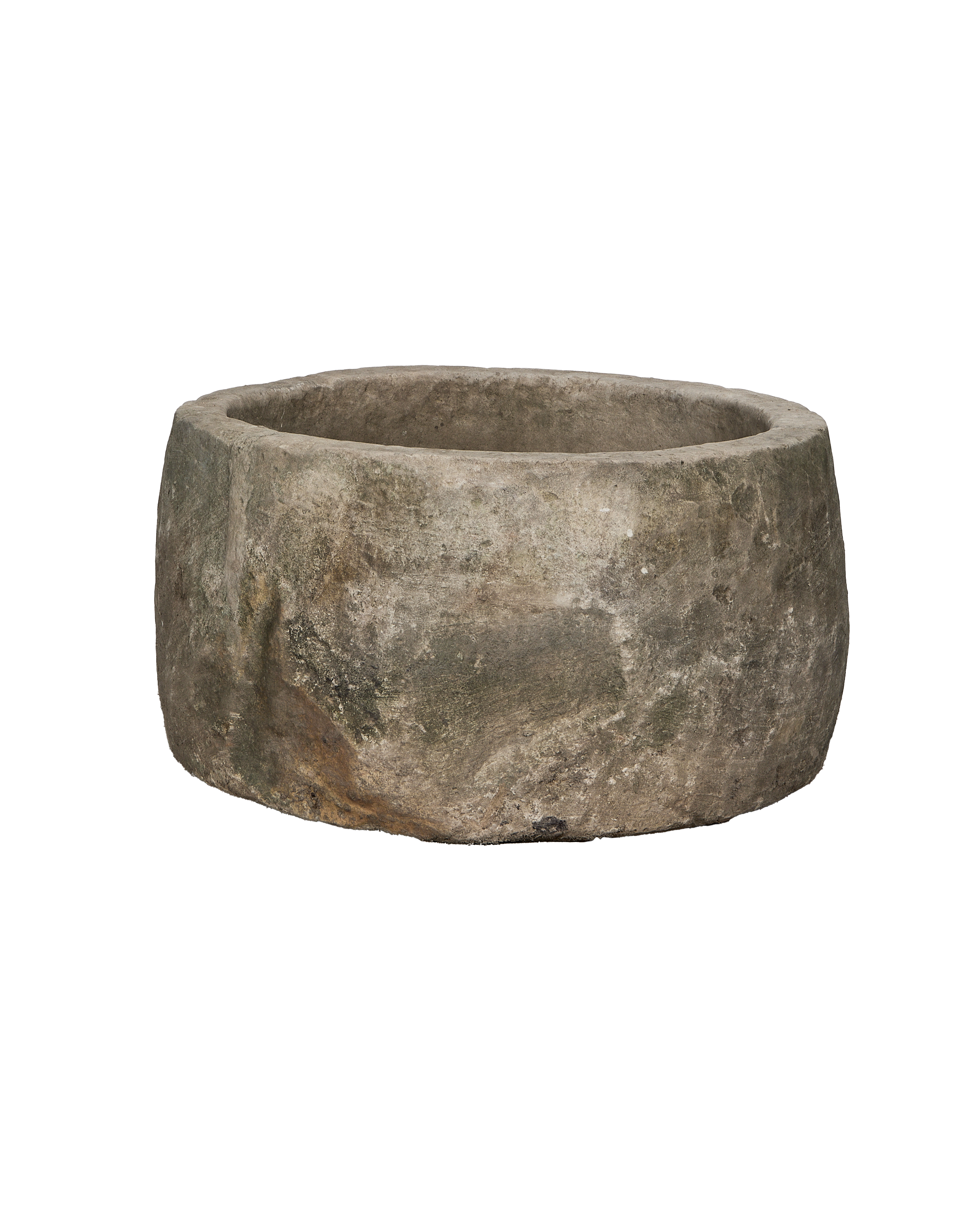 Round vintage limestone trough showcasing natural texture, minor chips, and weathered patina from a side angle.