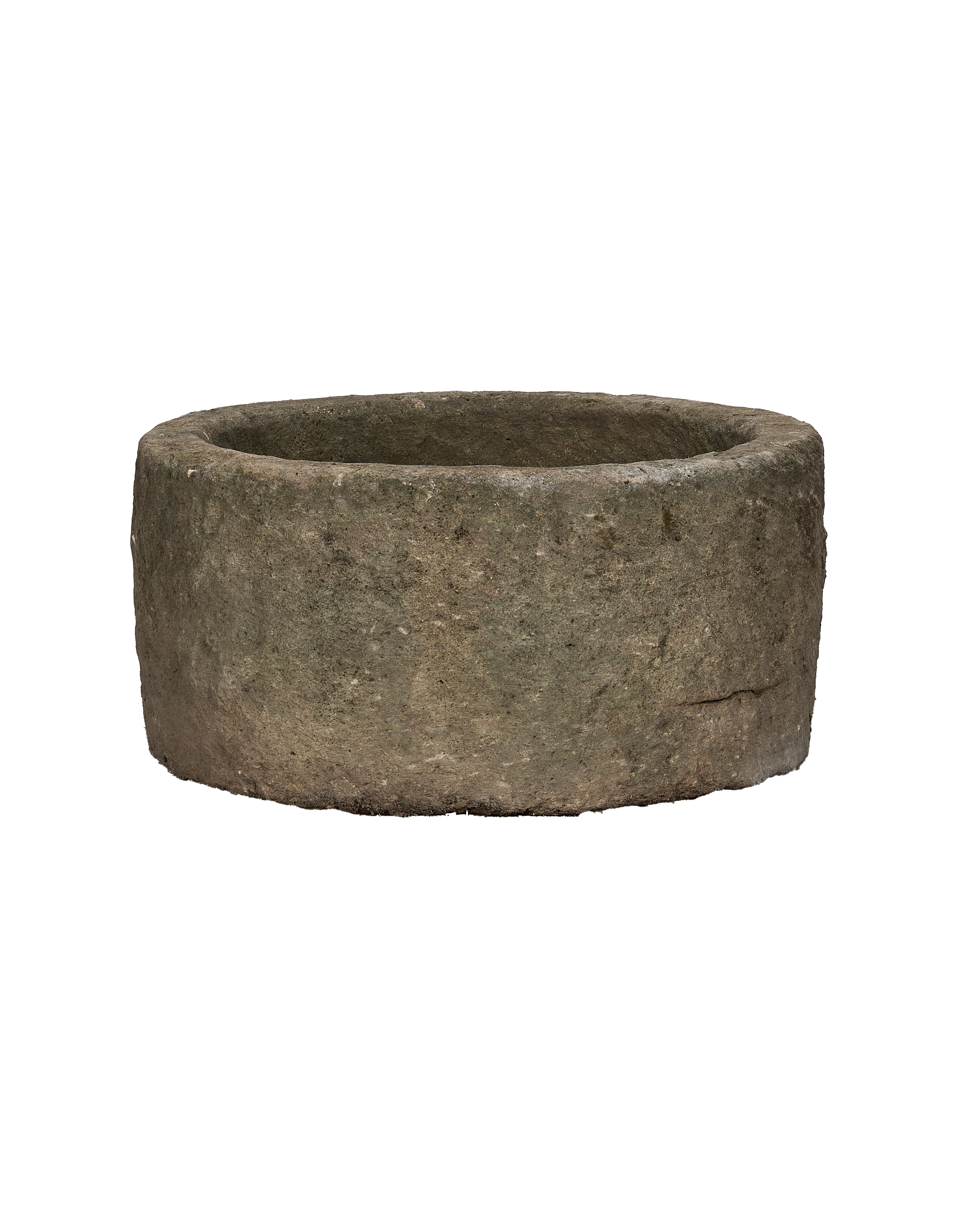 Vintage round limestone trough, aged grey texture with slight surface imperfections, Indo-inspired.