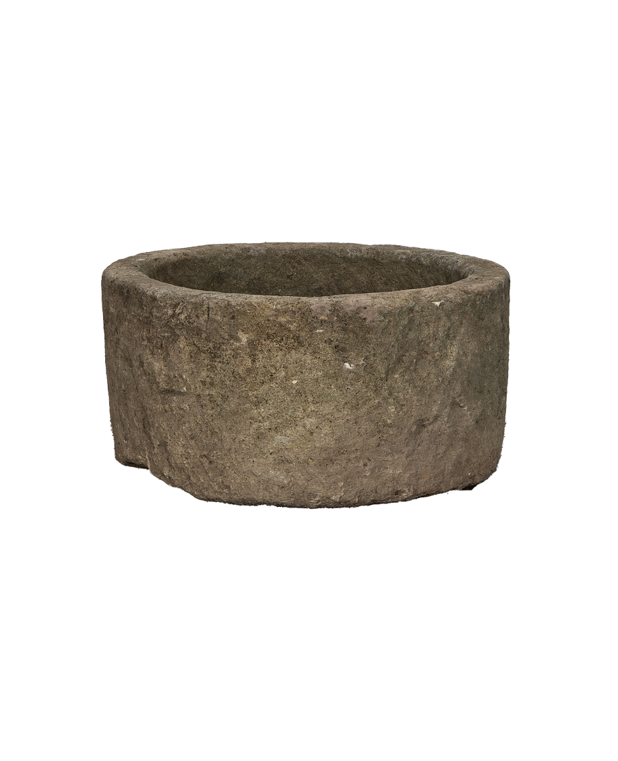 Vintage Indonesian round limestone trough, rich weathered texture and worn edges.