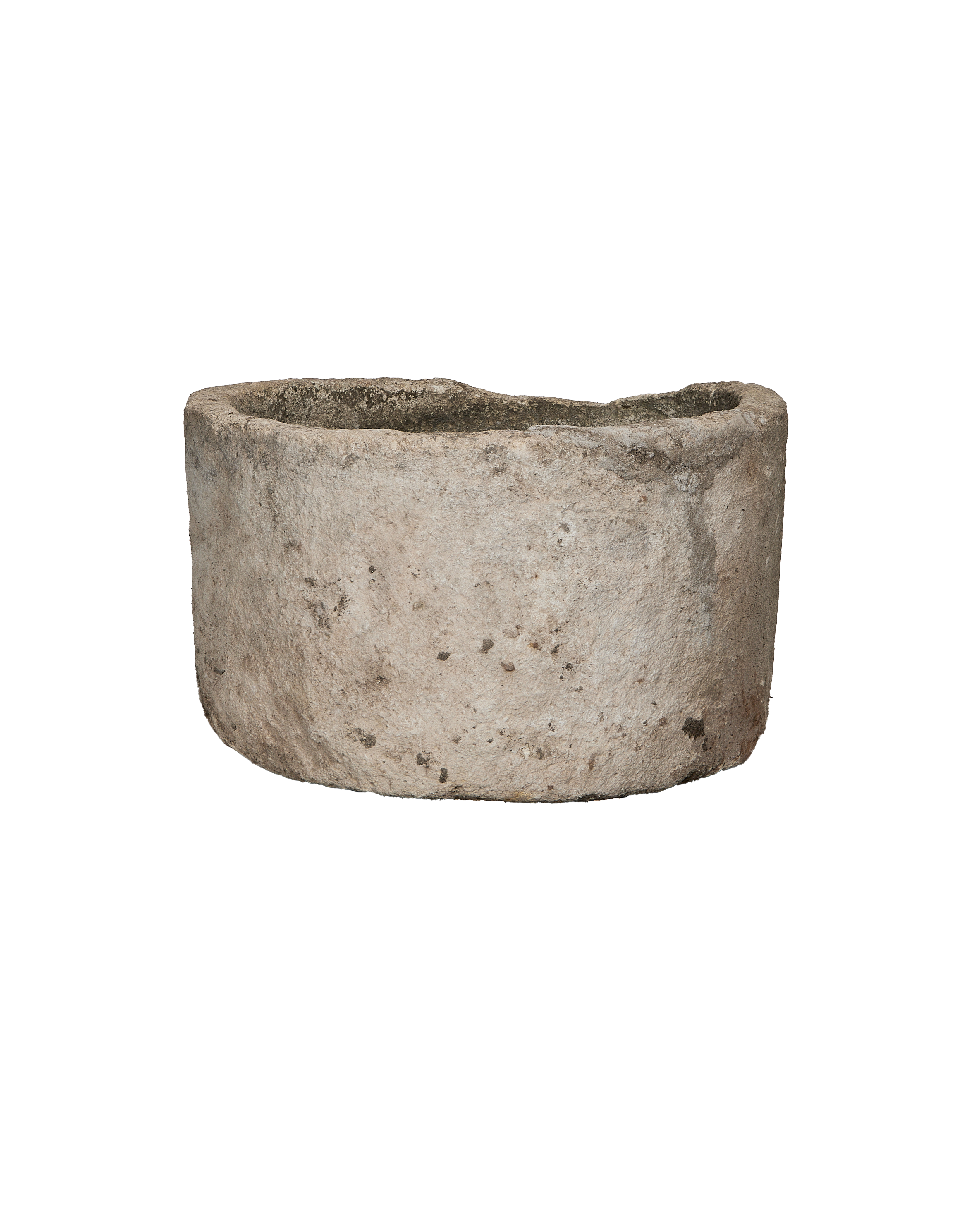 Round vintage Indonesian limestone trough showcasing weathered texture and rim detail on black.