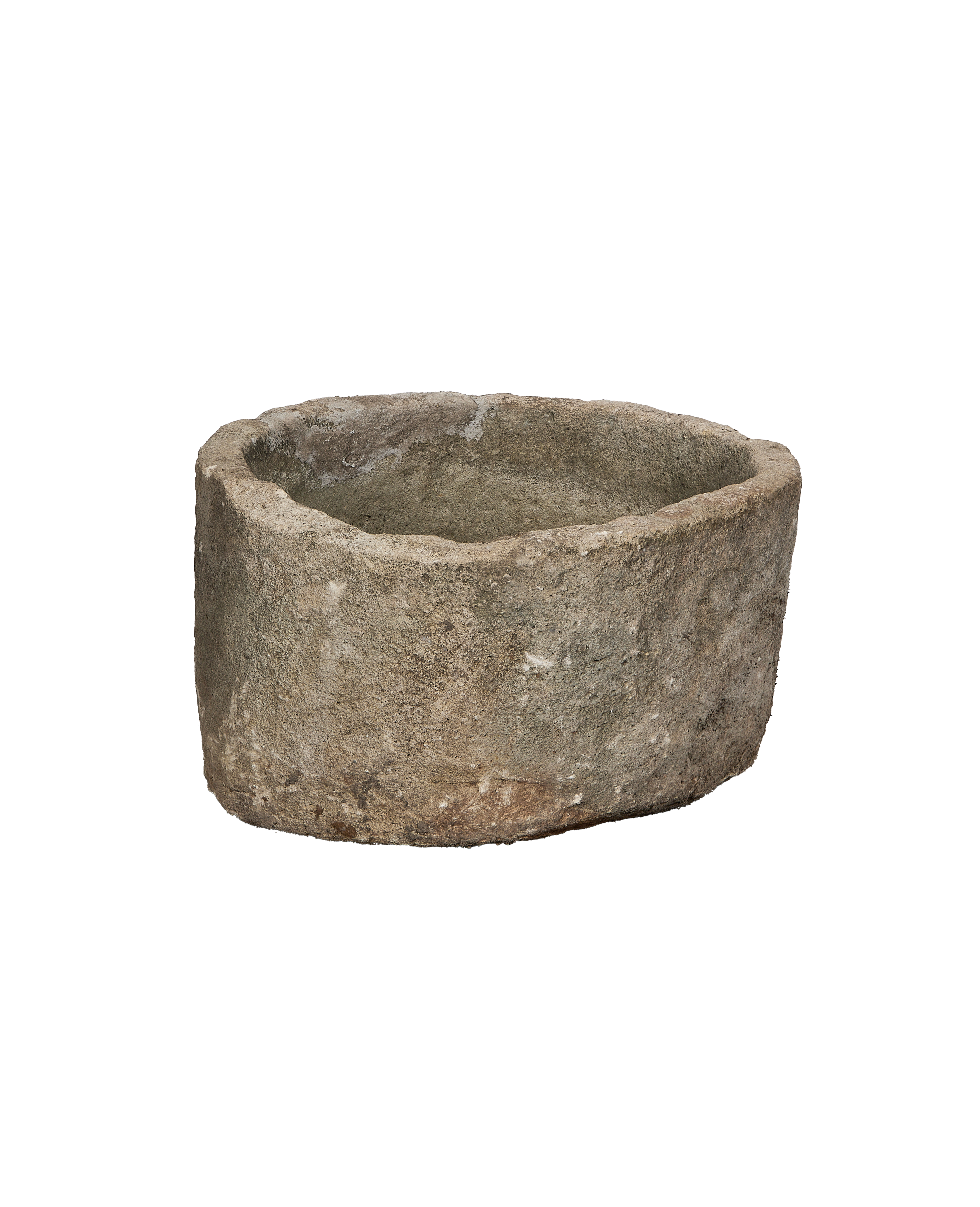 Vintage Indonesian round limestone trough, showing natural wear and rough textured exterior.