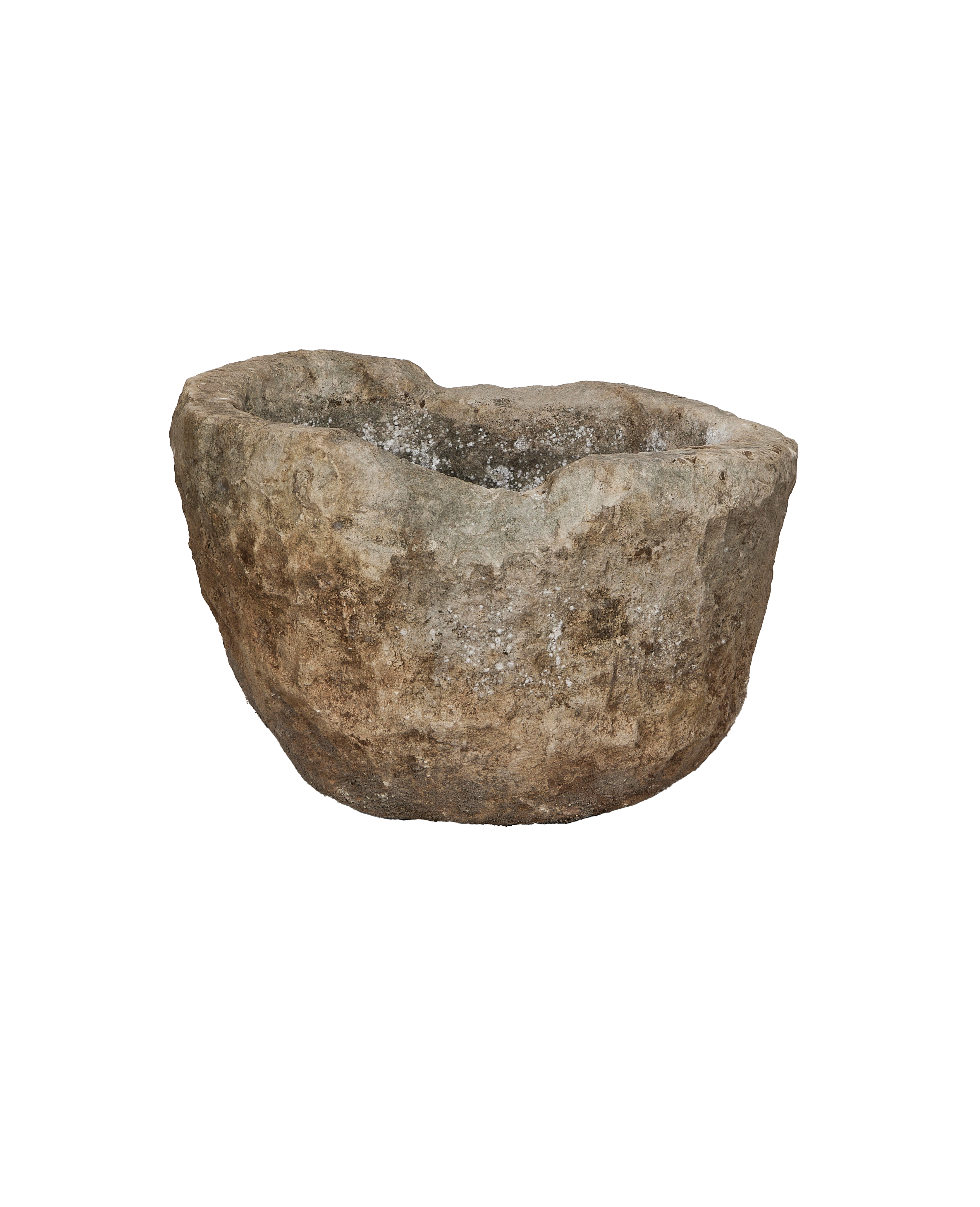 Vintage Indonesian round limestone trough, close-up of rough textured surface and weathered rim.
