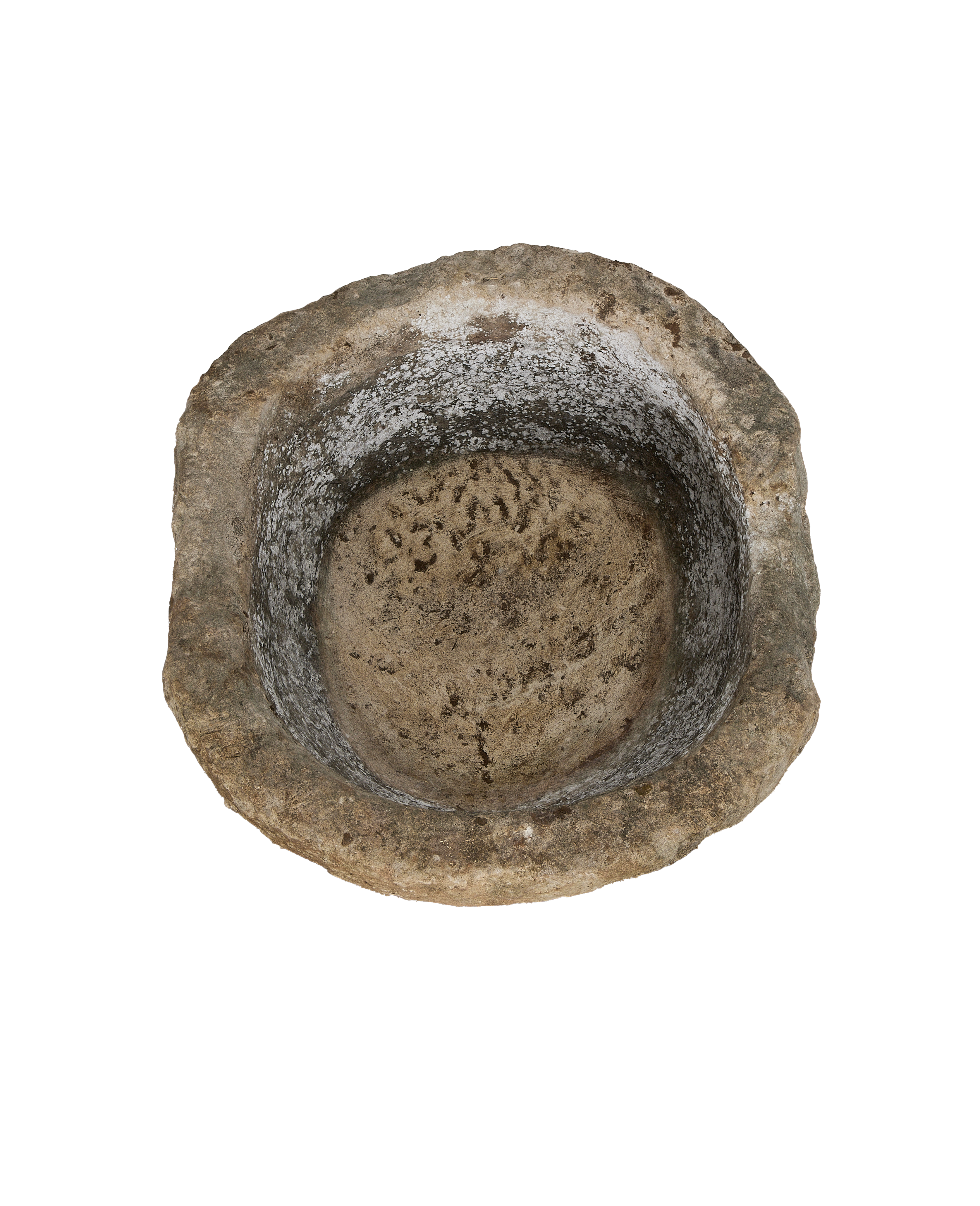 Vintage Indonesian round limestone trough, top-down view highlighting rough interior texture.