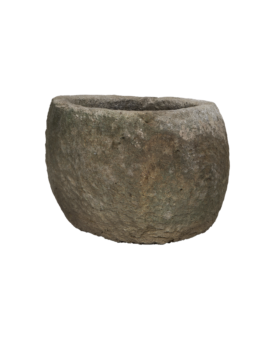 Vintage round limestone trough, rich texture, showing the weathered Indonesian OAK-like finish.
