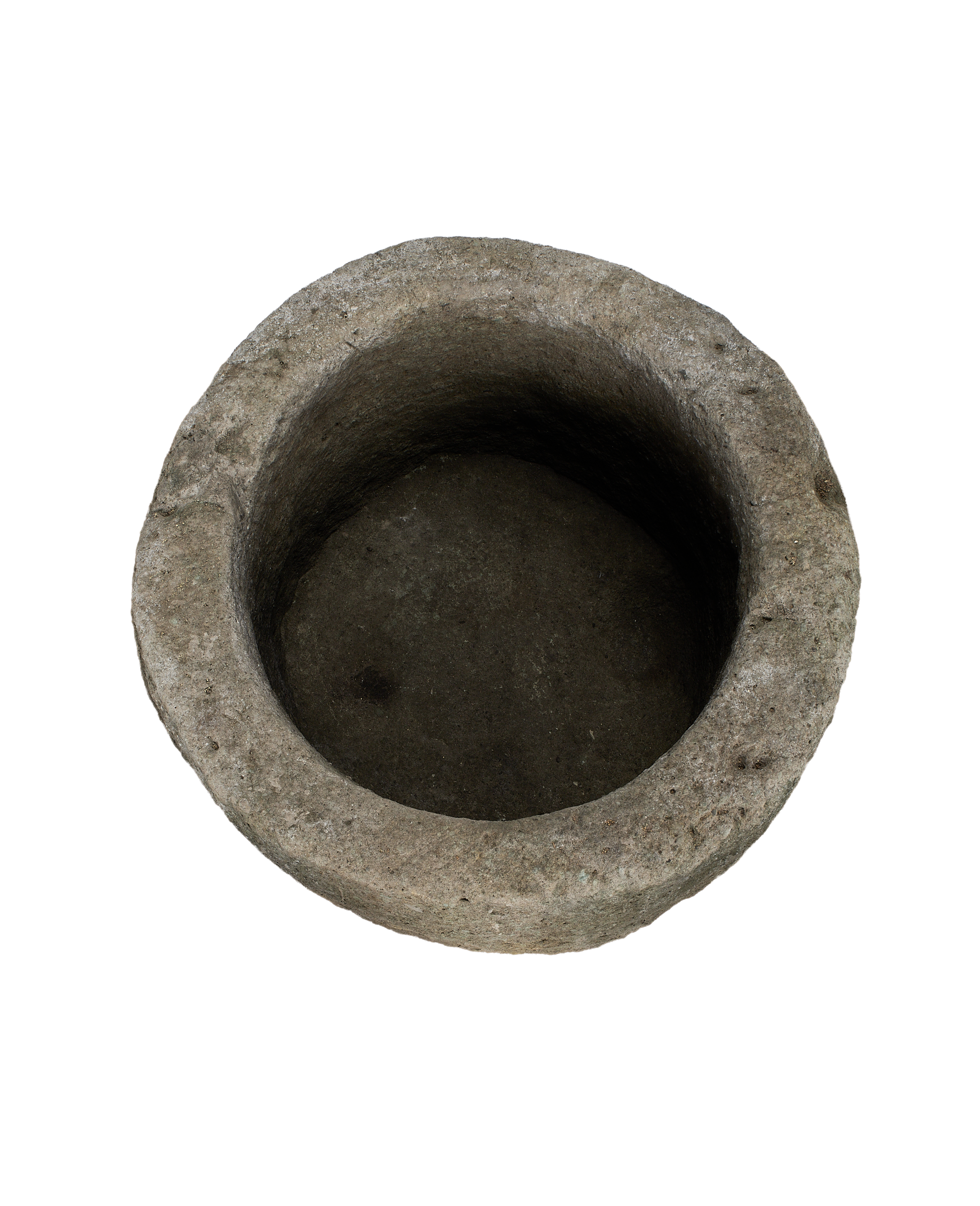 Vintage Indonesian round limestone trough, top-down view showing interior depth and rough texture.
