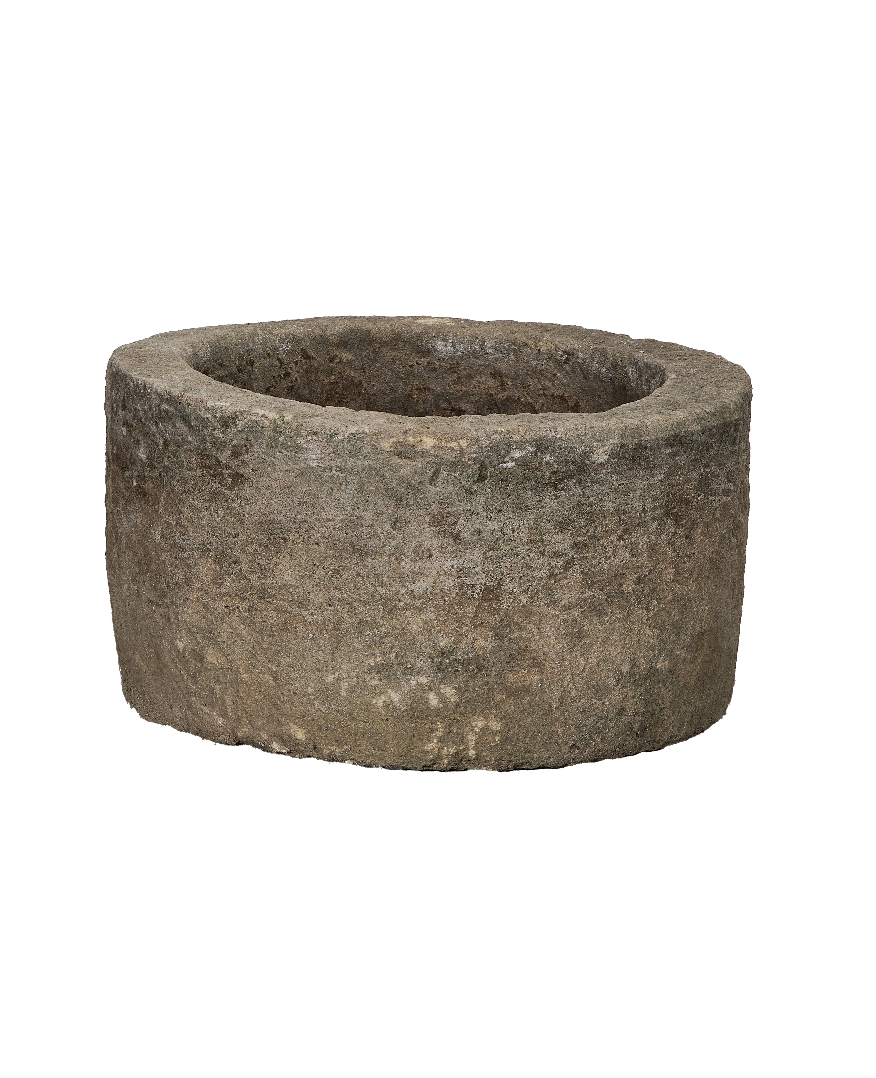 Vintage Indonesian round limestone trough, rough texture, weathered gray garden stone planter.