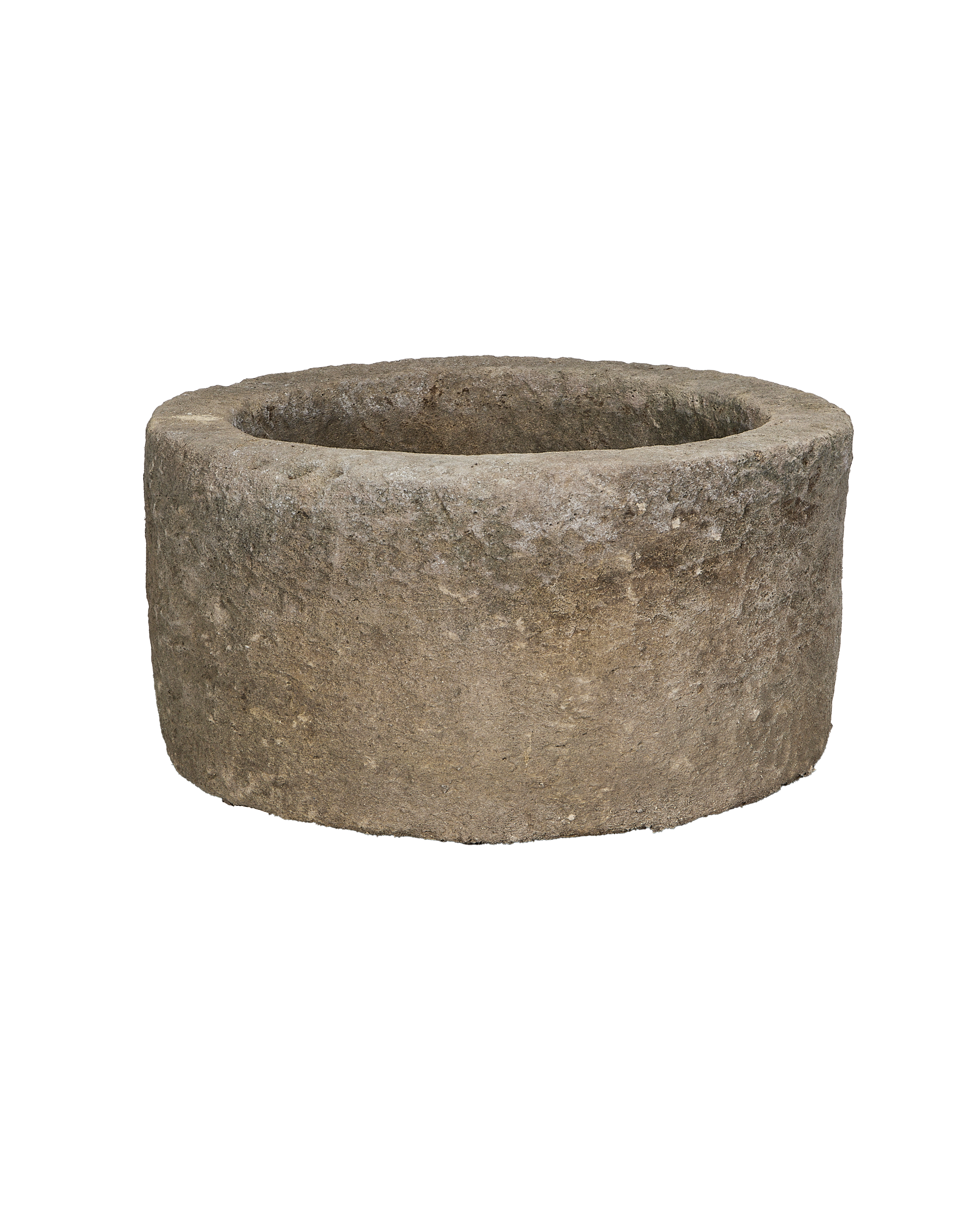 Vintage round Indonesian limestone trough, top view highlights weathered rim texture.