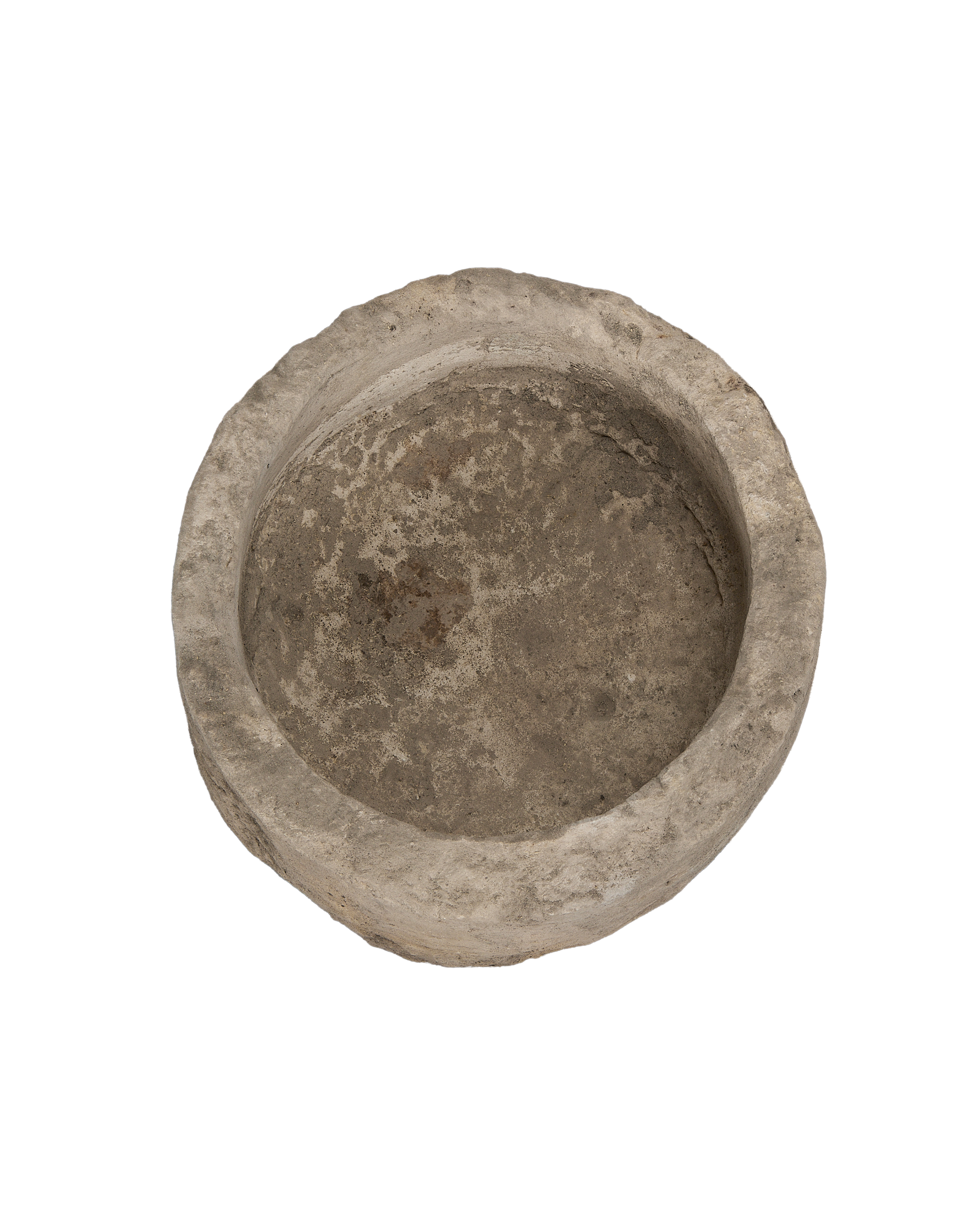 Vintage Indonesian round limestone trough, top-down view showing interior texture.