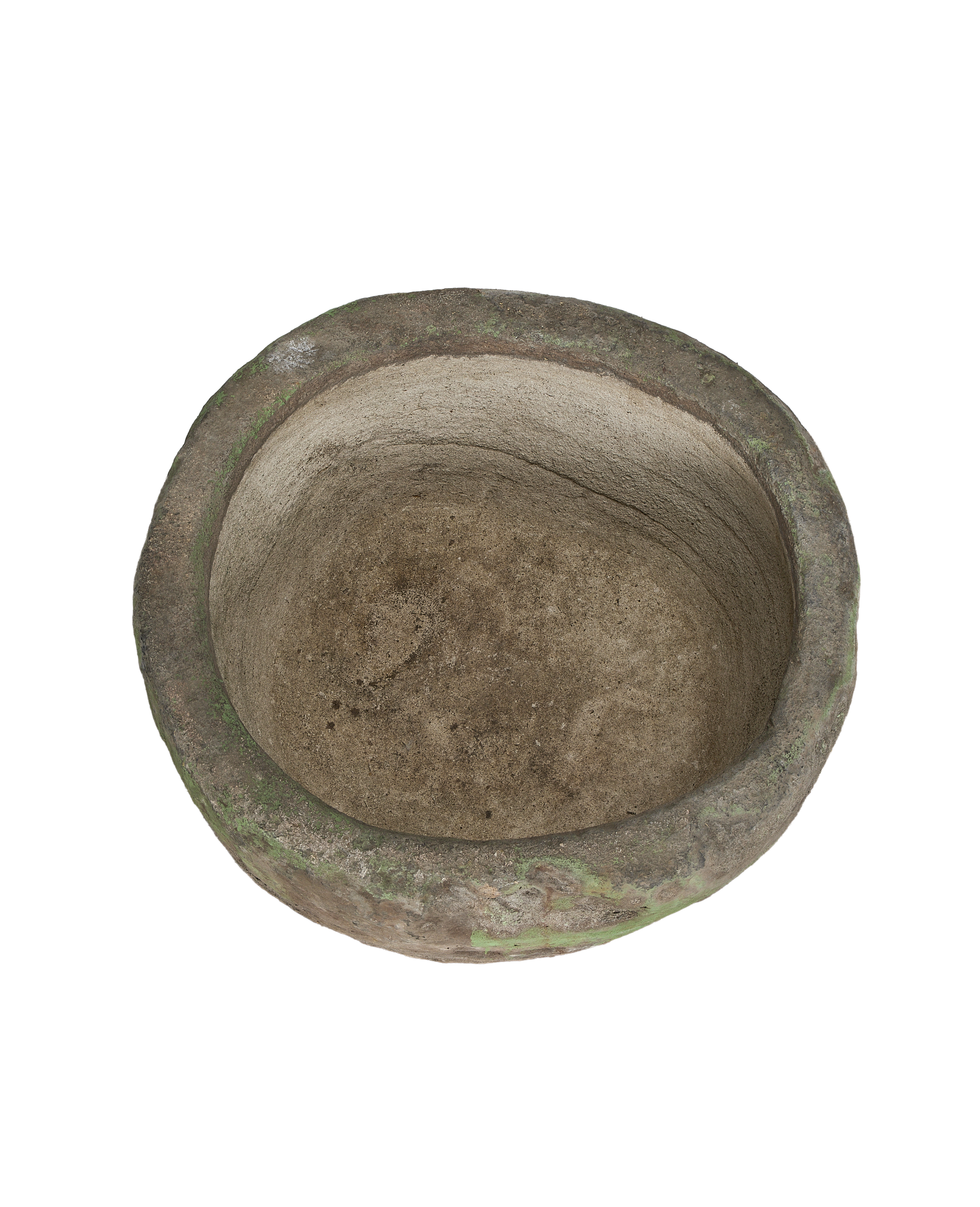 Vintage Indonesian round limestone trough, aged interior surface and rim with natural moss growth.
