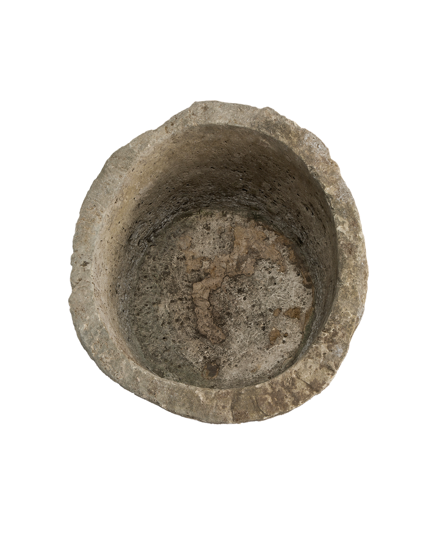 Vintage Indonesian limestone trough viewed directly from overhead, showing round interior.