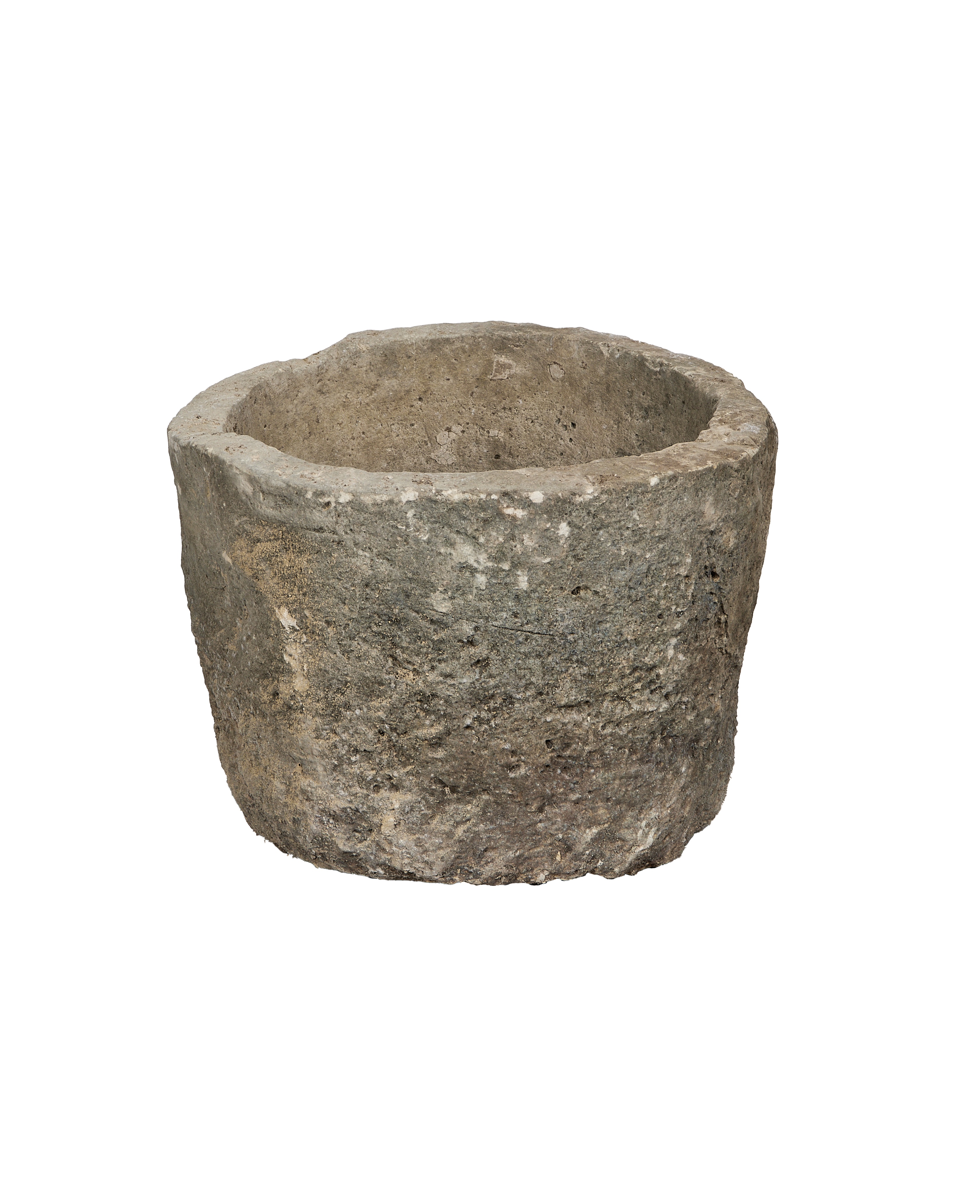 Vintage round limestone trough, OAK from Indonesia. Textured stone exterior in profile, showing rugged edge.