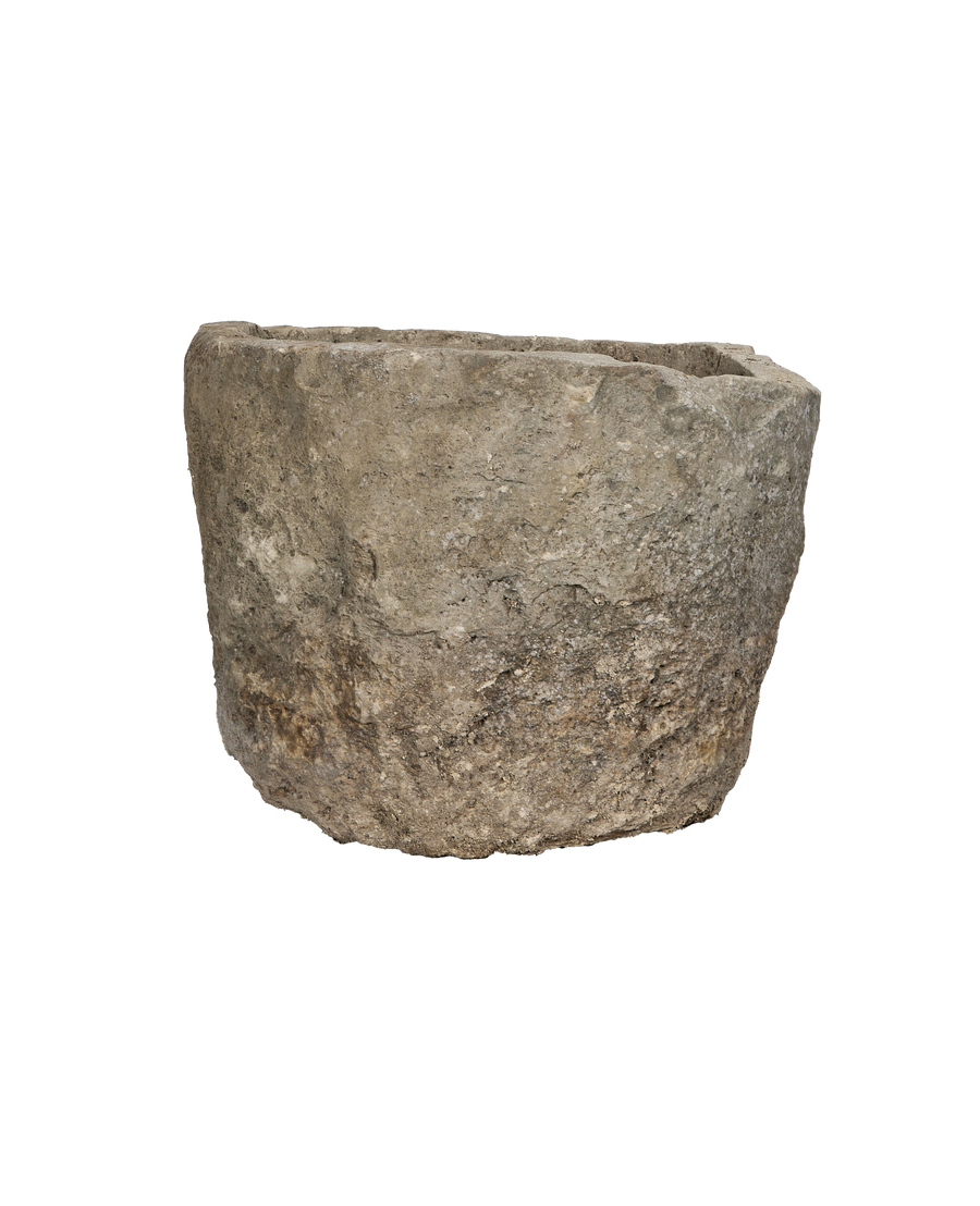 Vintage round limestone trough from Indonesia, showcasing weathered texture and rim detail.