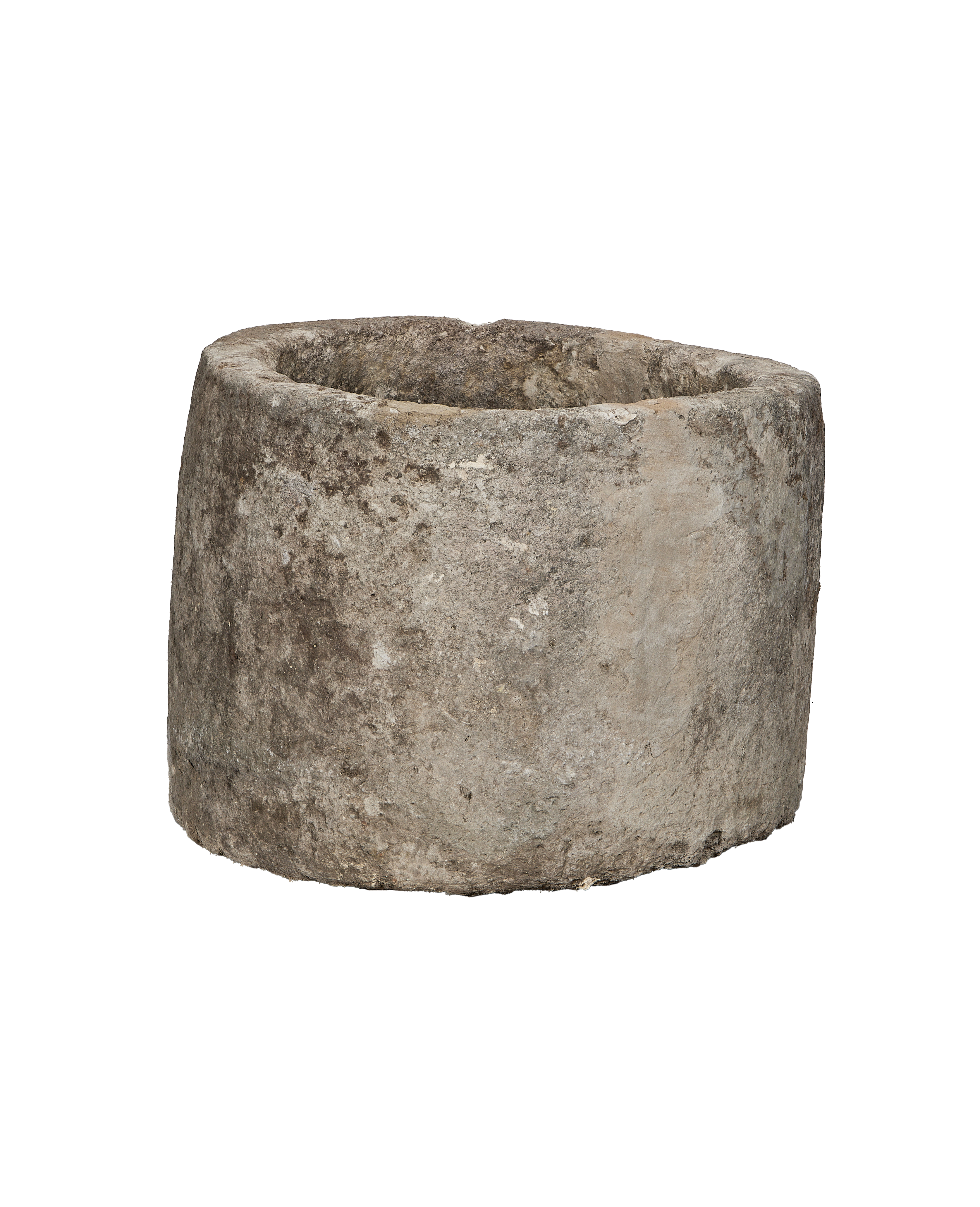 Vintage Indonesian round limestone trough, showing distressed texture and natural patina detail.