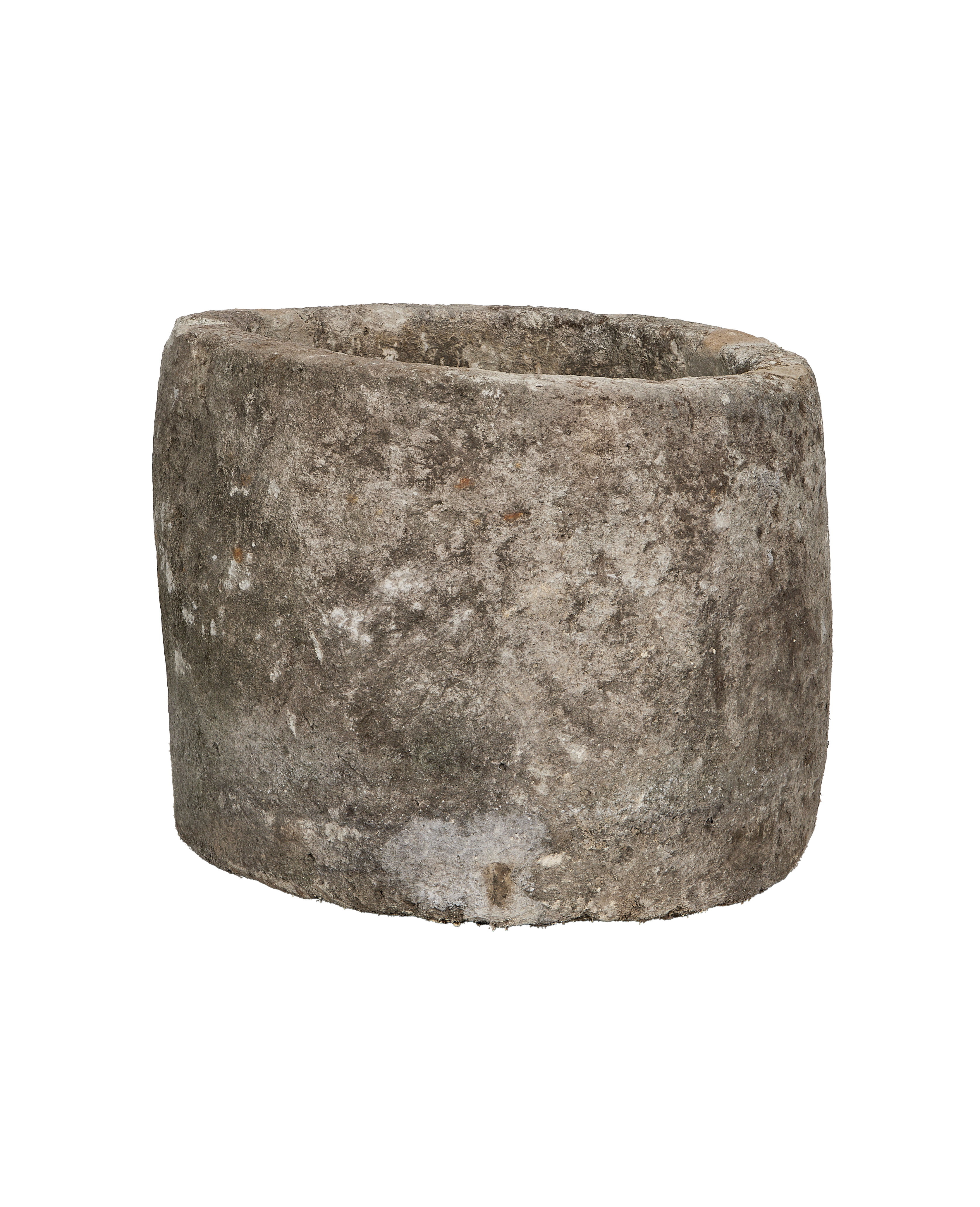 Vintage round limestone trough, coarse weathered texture, visible rim detail from a side angle.