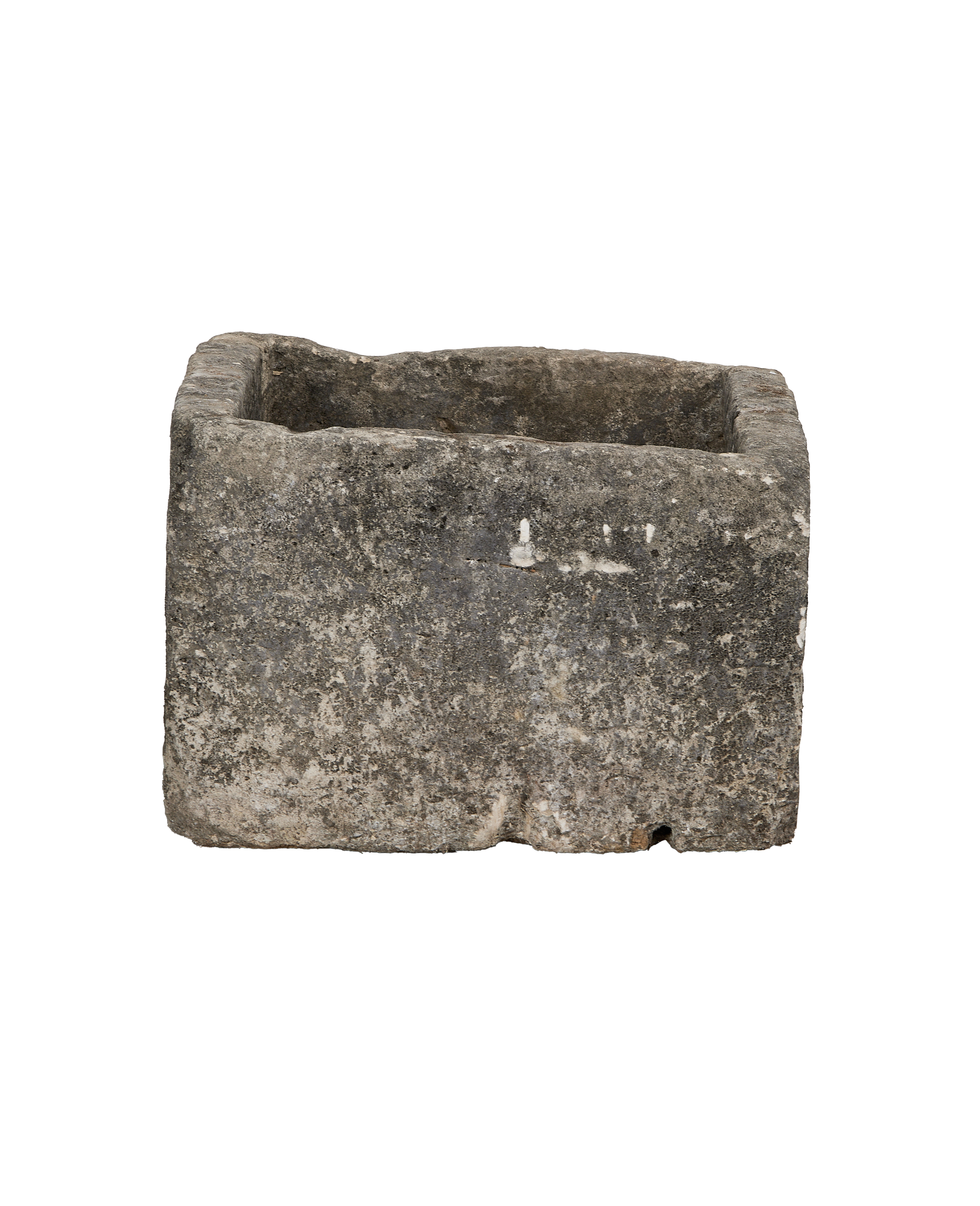 Vintage limestone trough from Indonesia, exterior features weathered rock texture and slight chipping.