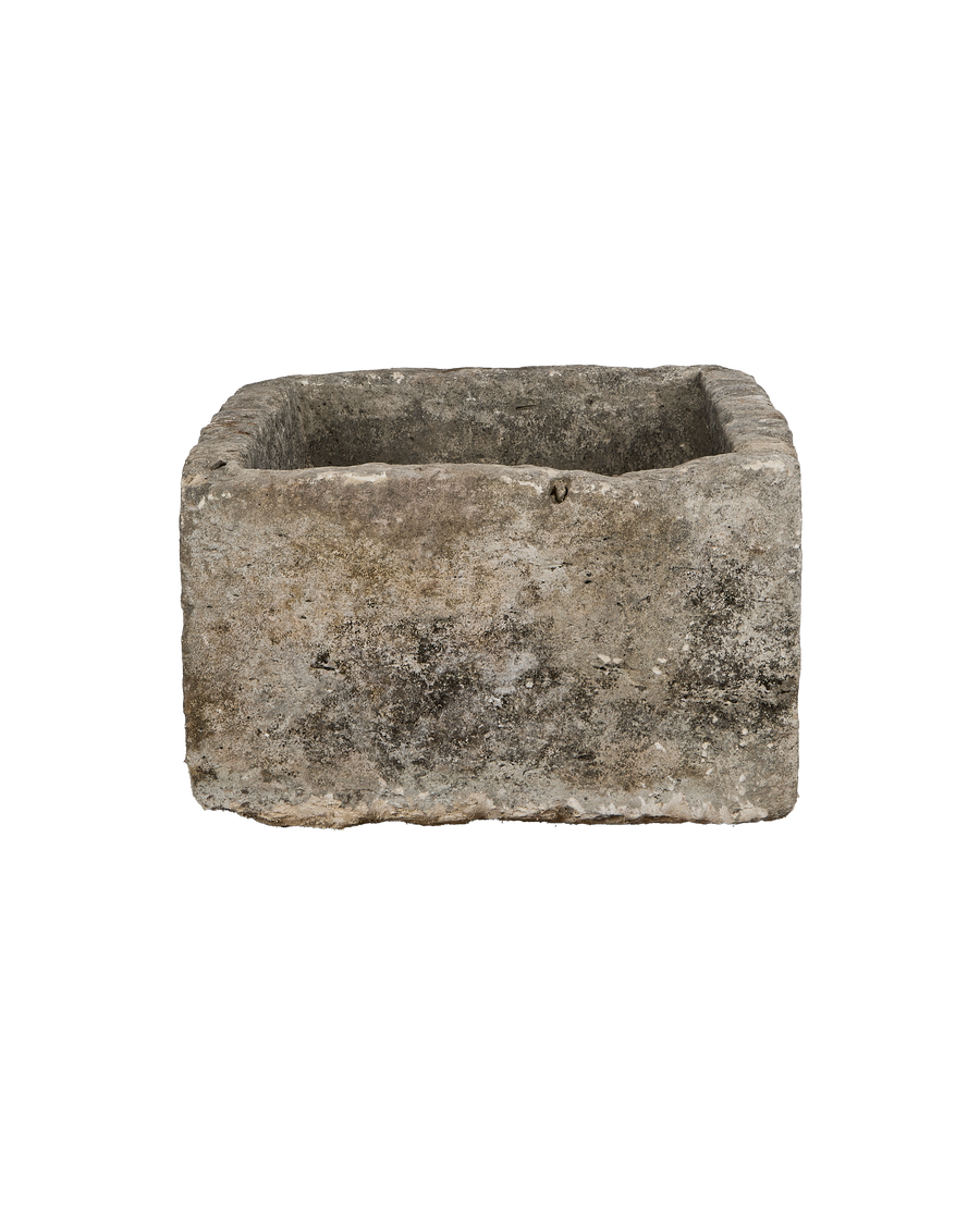 Vintage Indonesian rectangular limestone trough showing full front and textured side profile.