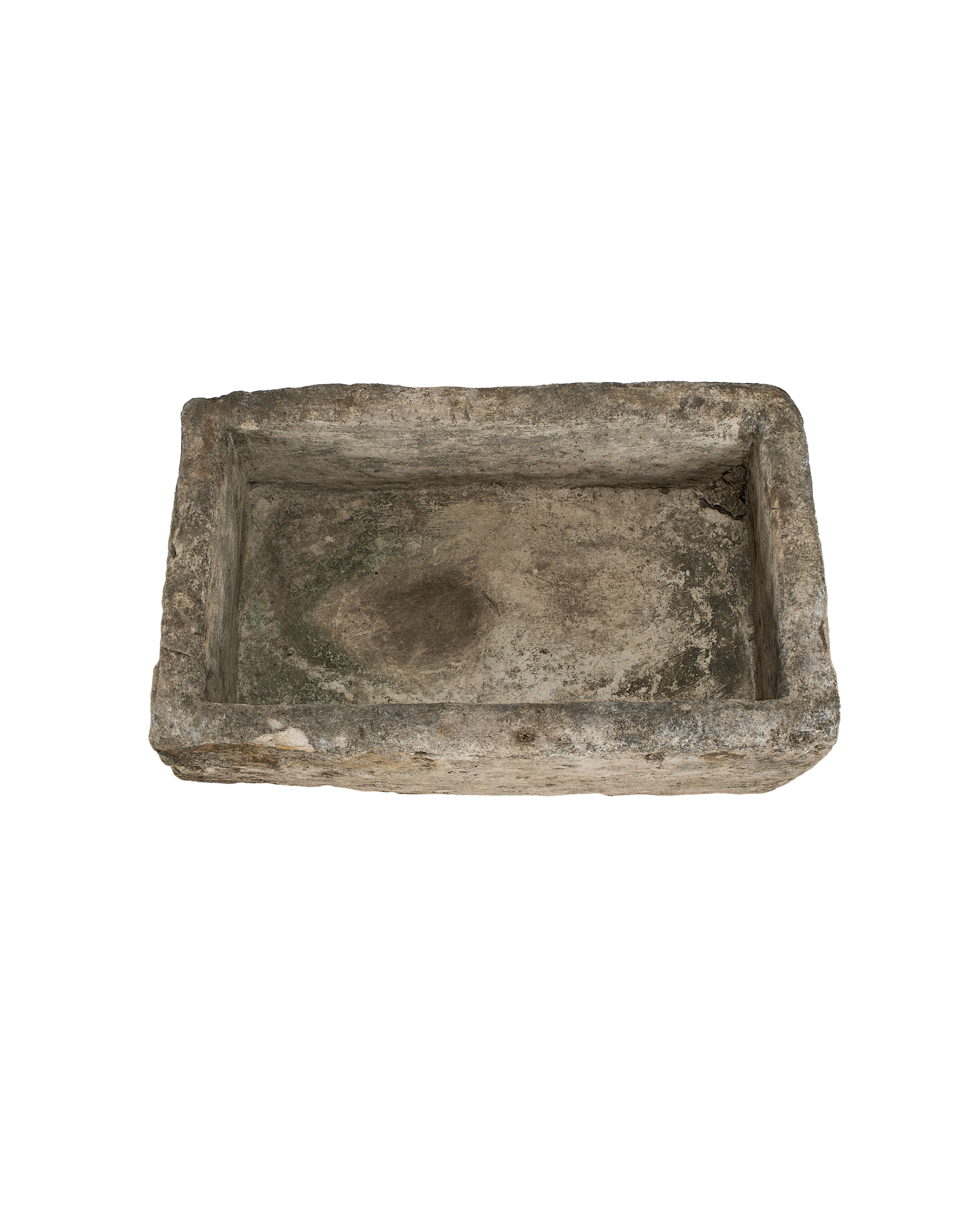 Vintage rectangular limestone trough, showing weathered interior with subtle moss and texture.
