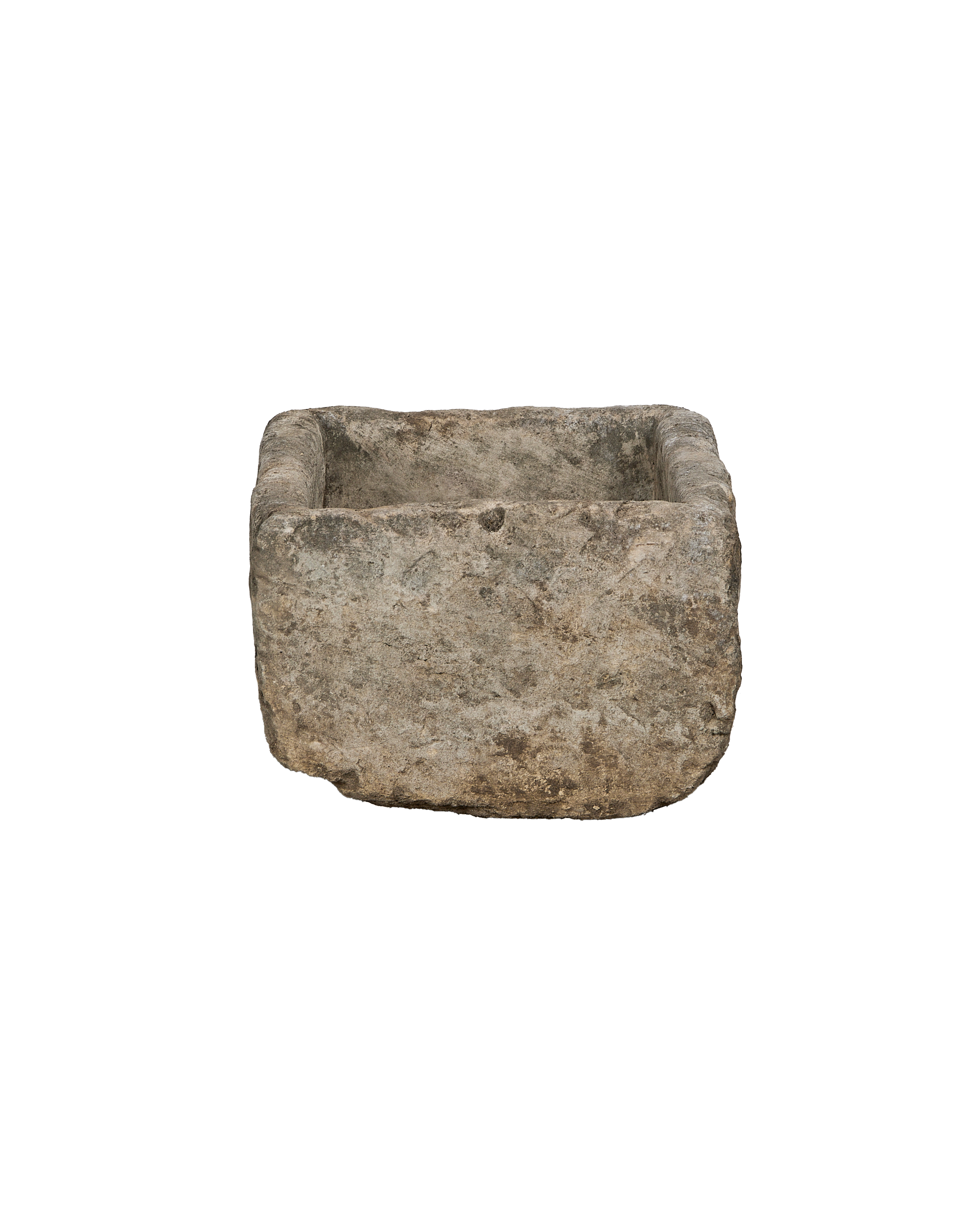 Vintage Indonesian rectangular limestone trough showing weathered, textured side with rough-hewn edges.