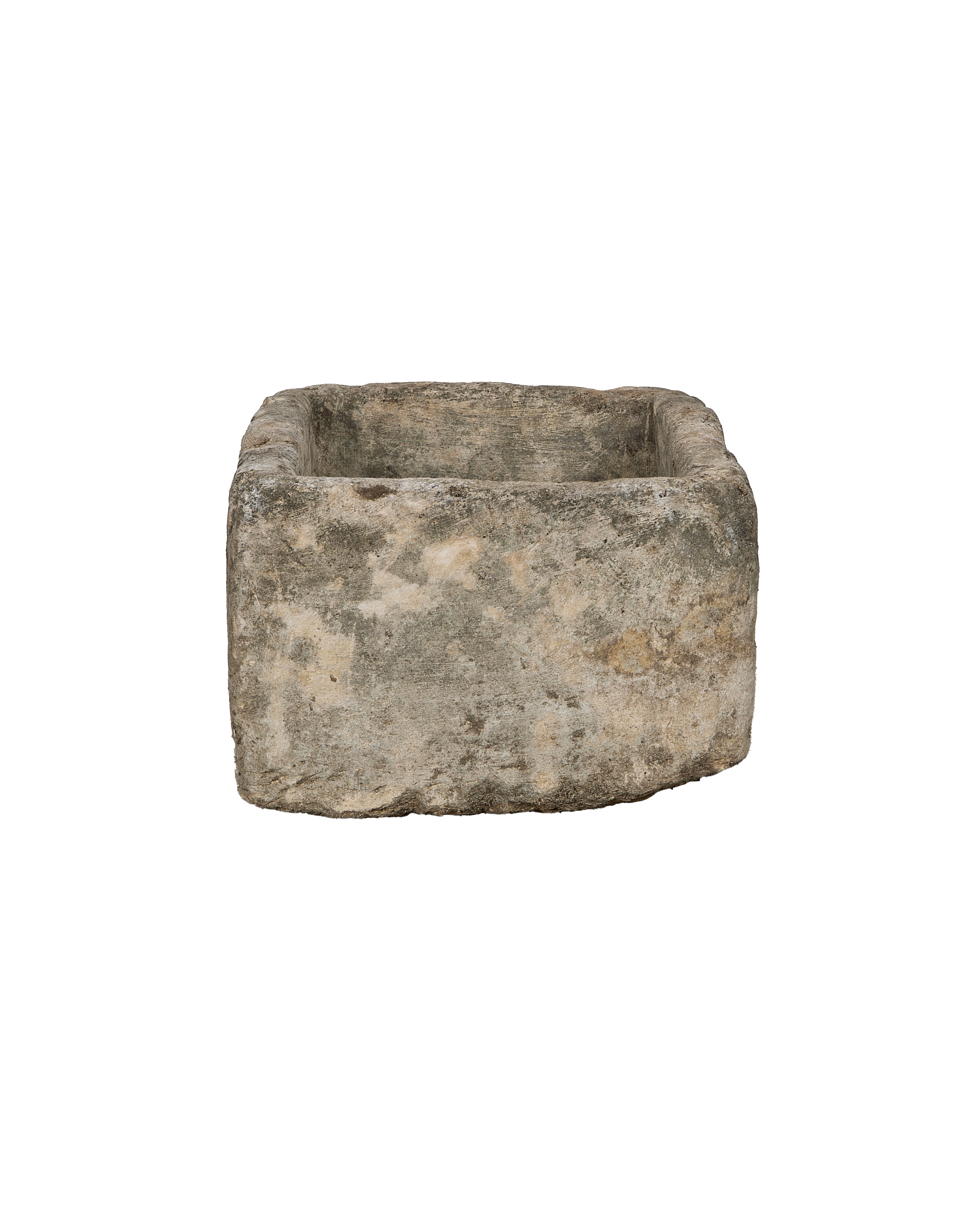 Vintage Indonesian limestone trough, displaying rugged texture and weathered sides.