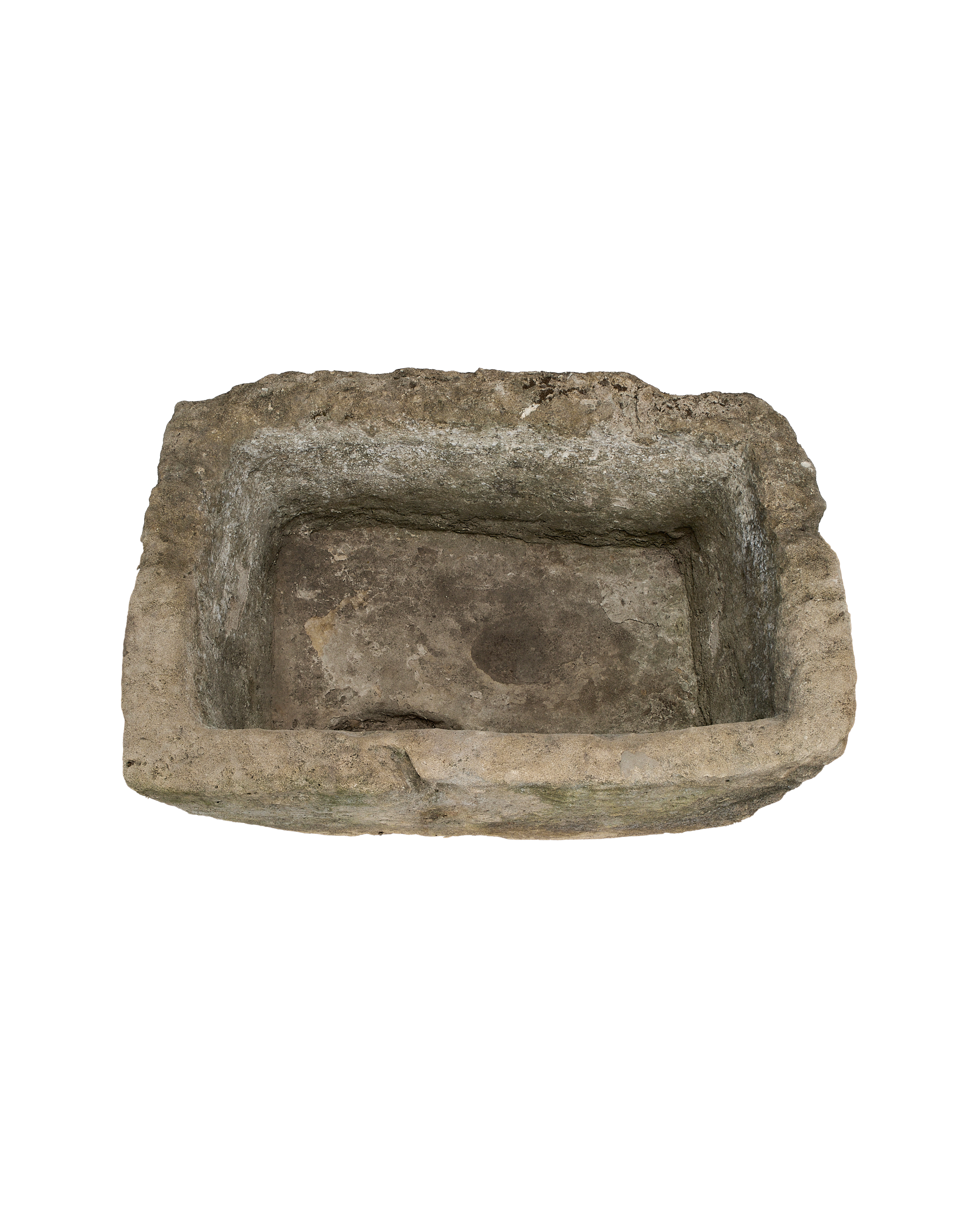 Vintage Indonesian rectangular limestone trough, top view revealing rough interior texture and weathered details.