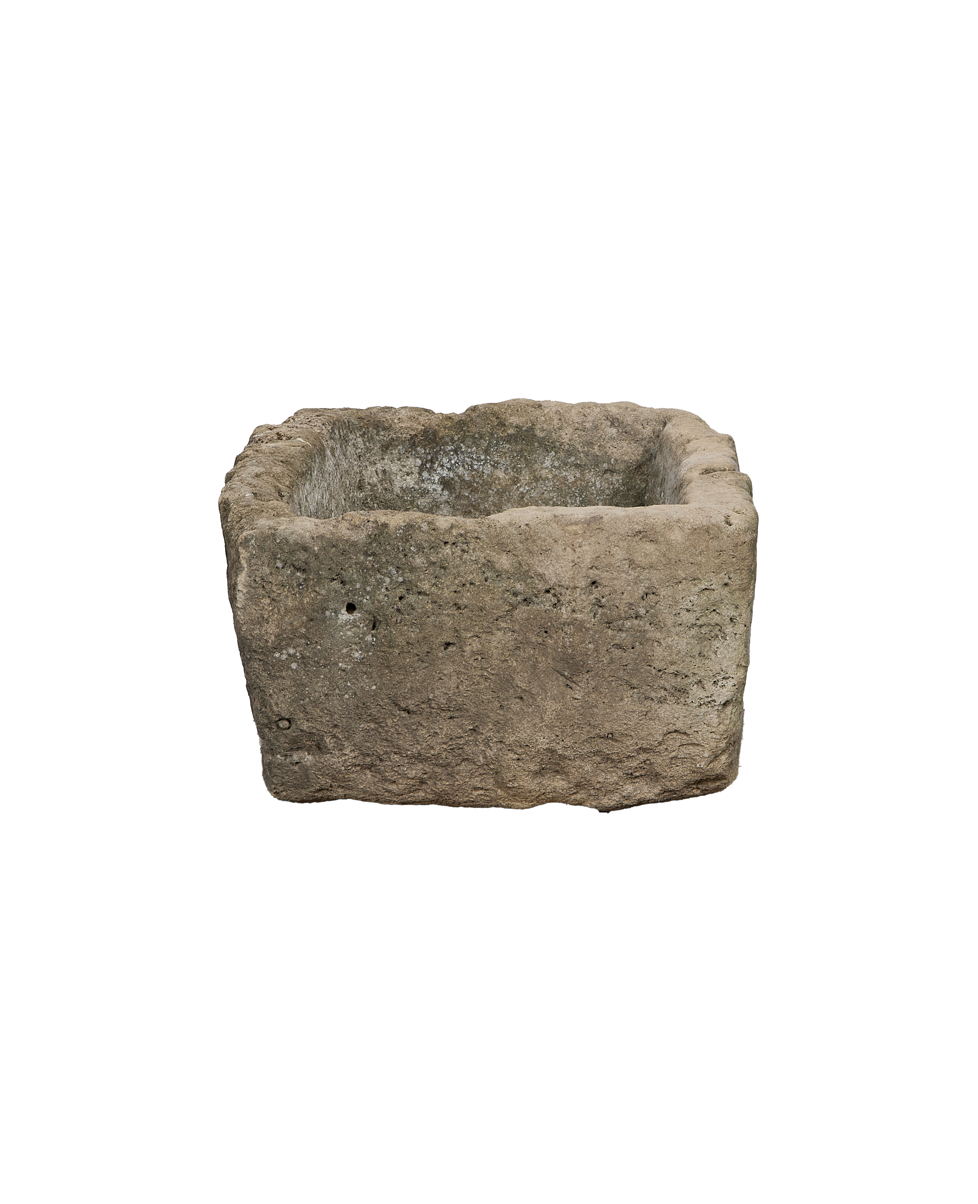 Rectangular vintage Indonesian limestone trough with rough, aged texture and visible interior.