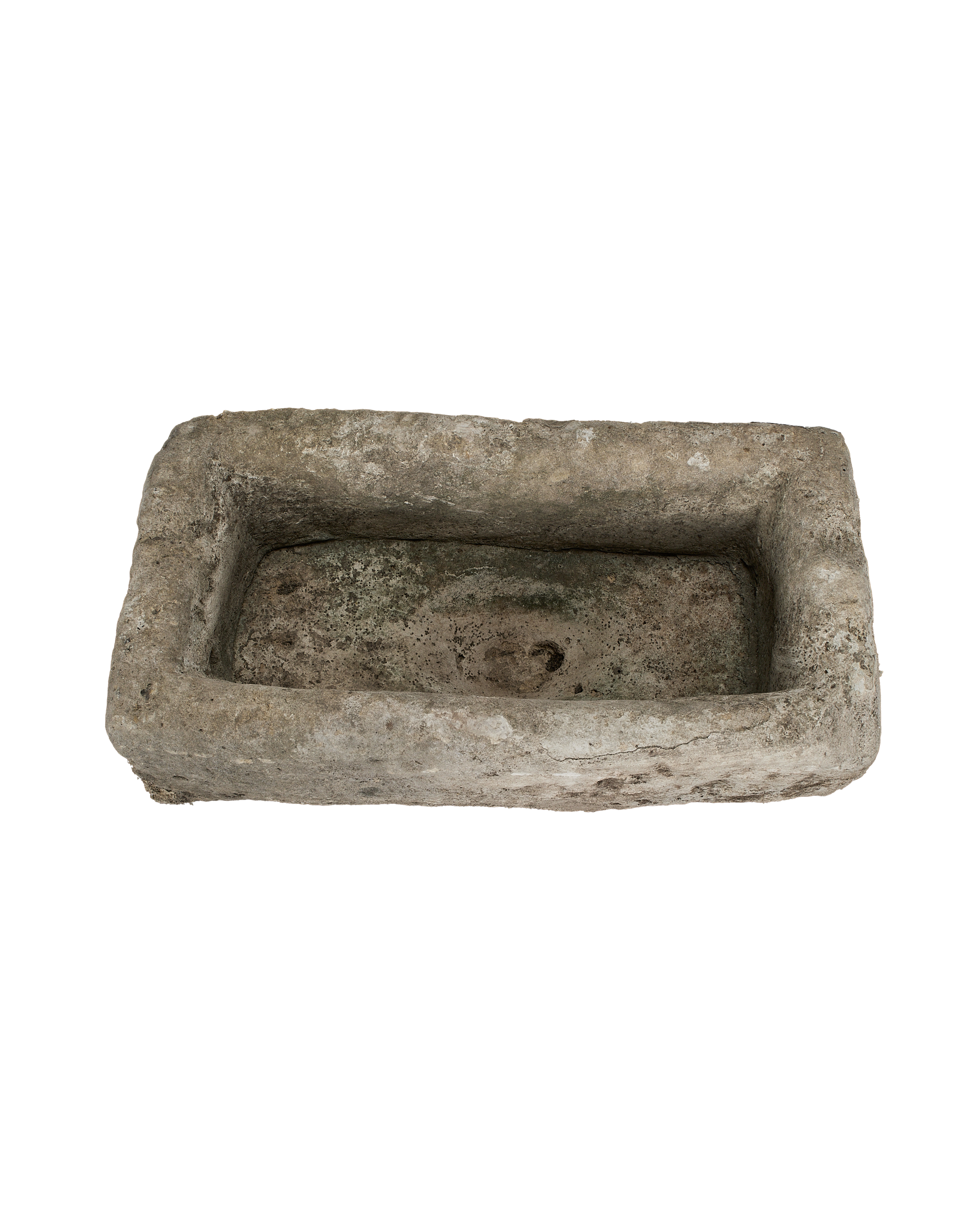 Vintage rectangular limestone trough, top view highlights weathered texture and aged patination.