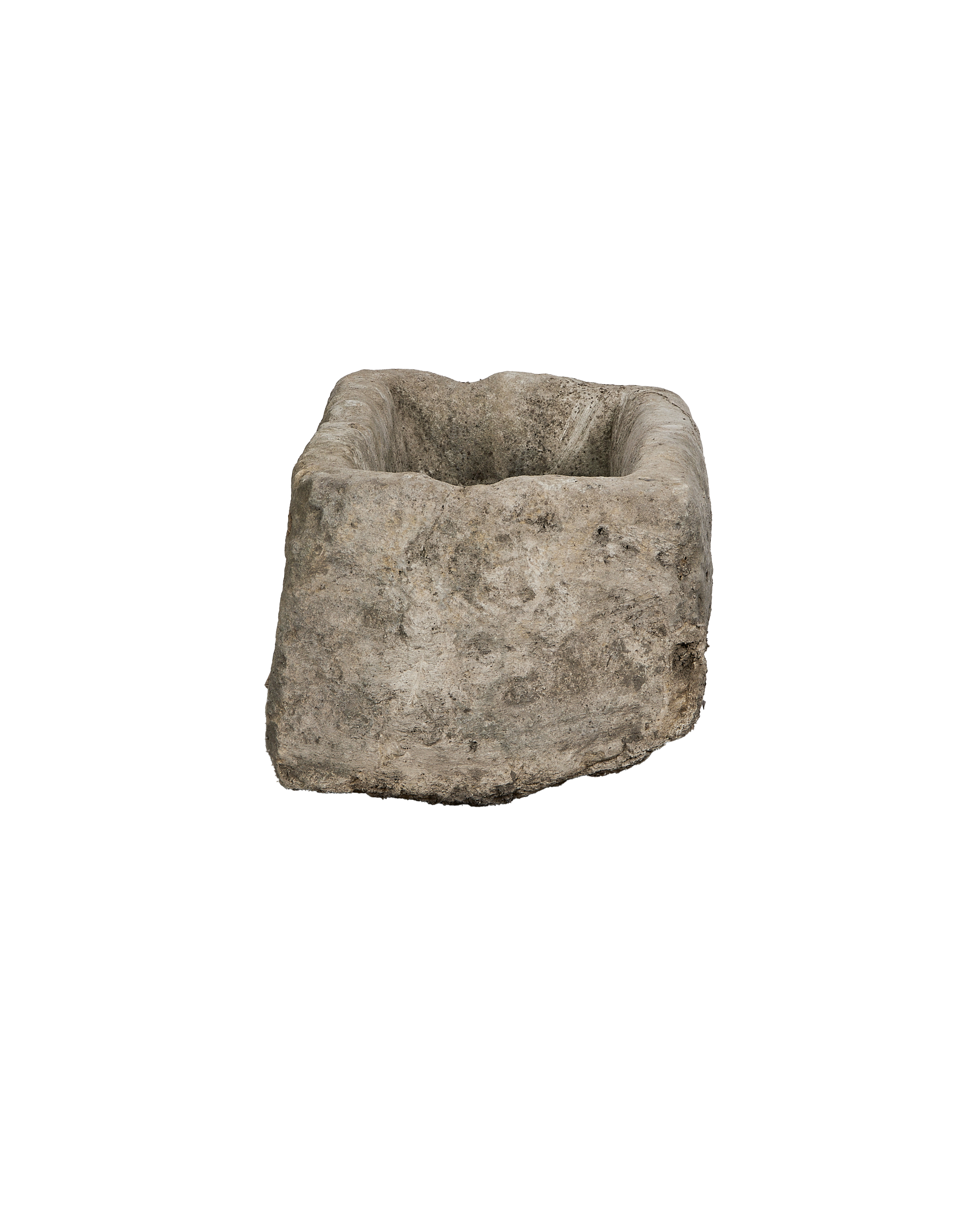 Vintage rectangular limestone trough, showing the rough, weathered texture and interior basin.