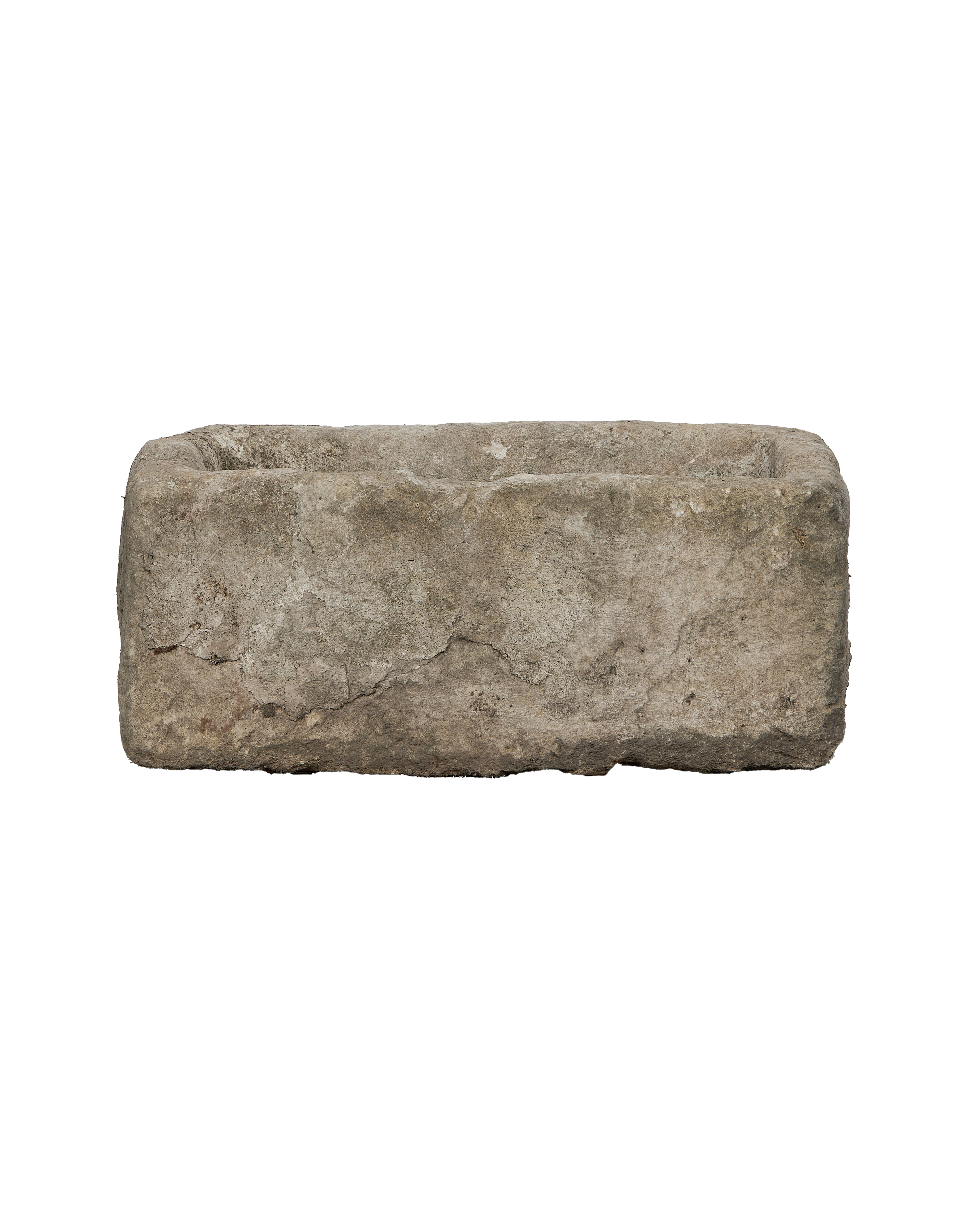 Vintage rectangular limestone trough, bottom view revealing natural weathered cracks in stone.