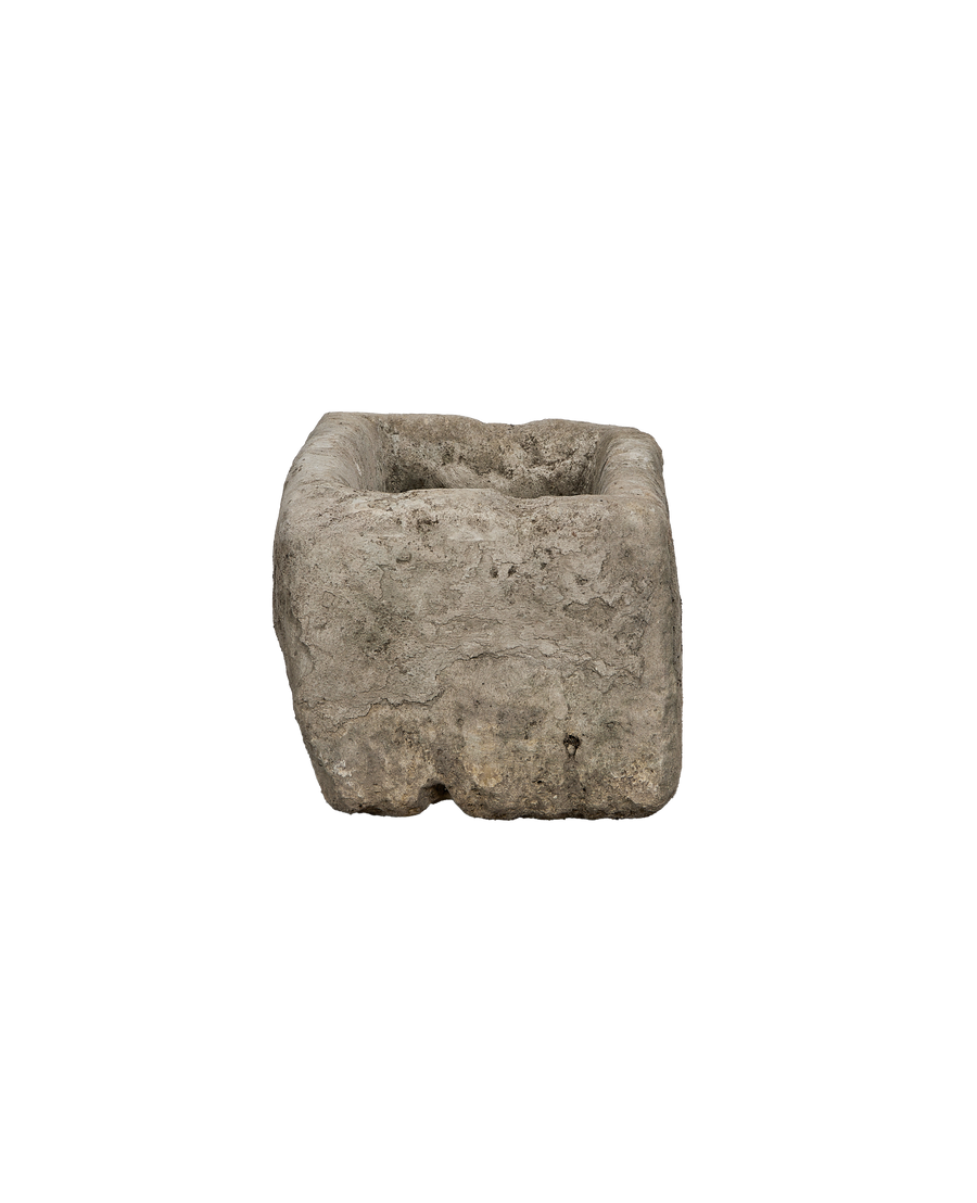 Vintage limestone trough from Indonesia, view showcasing its aged, weathered texture and rectangular form.