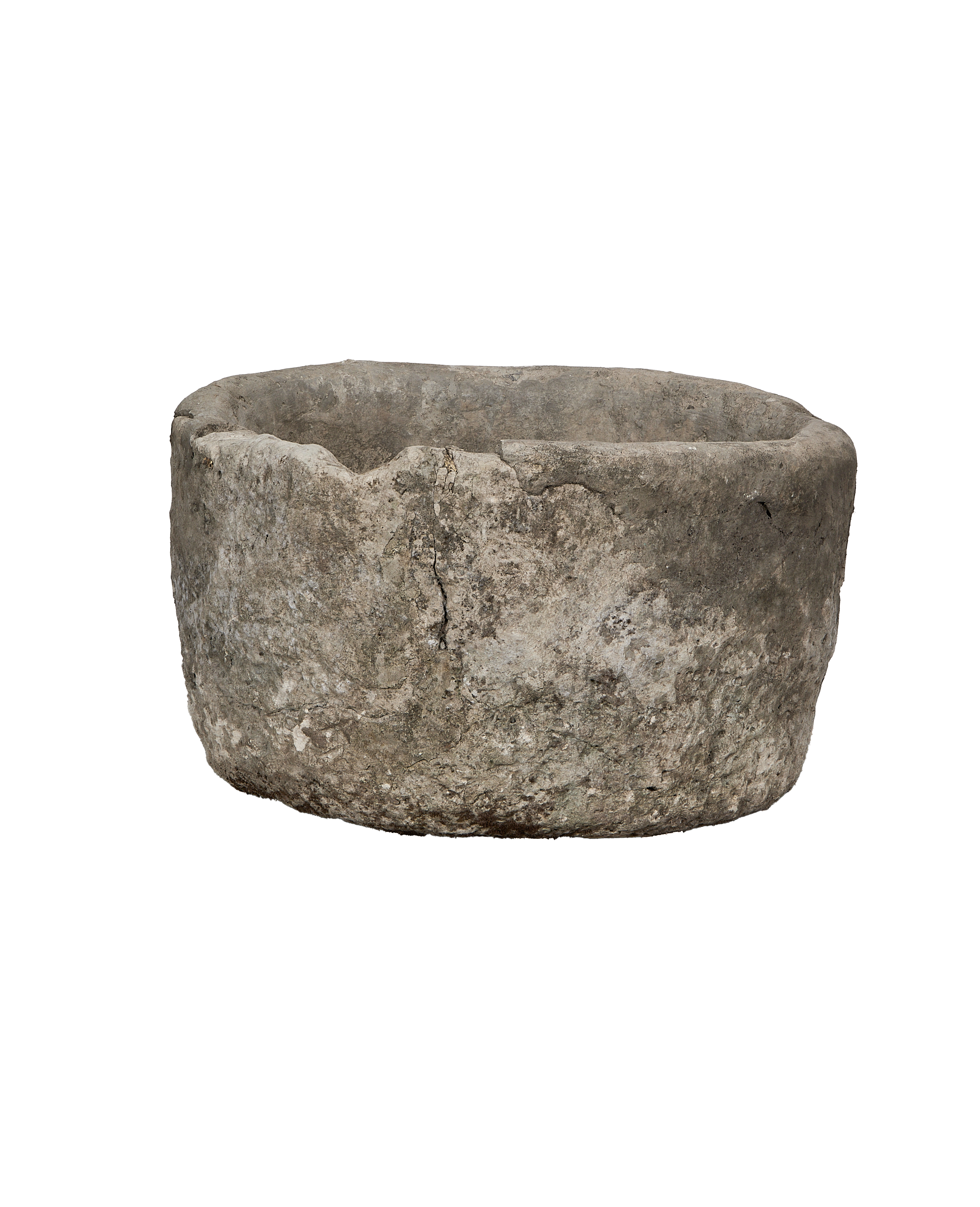 Vintage Indonesian limestone trough, round, showing detailed weathered texture and age-related chips.