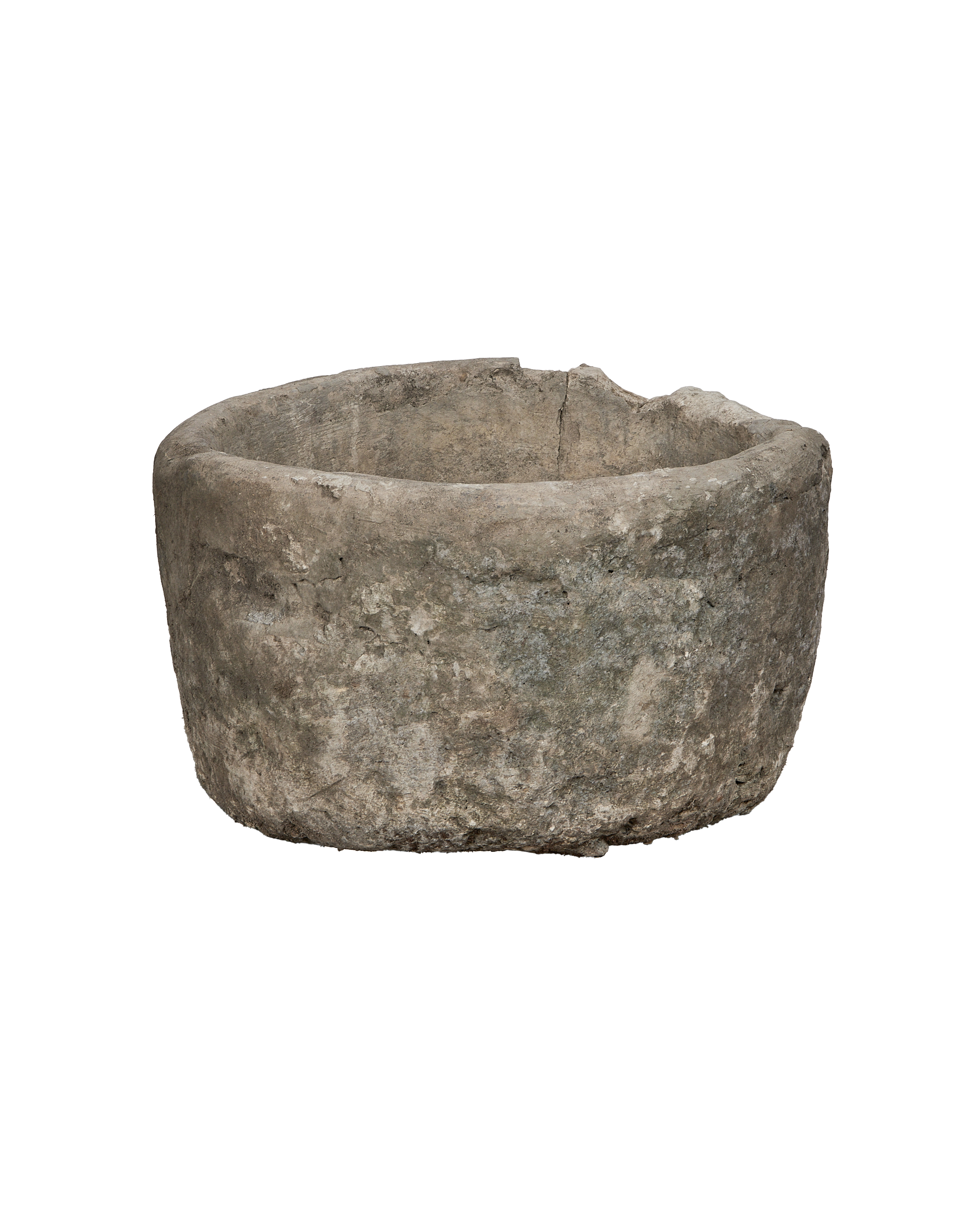 Vintage Indonesian limestone trough closeup, showcasing rough texture and weathered finish.