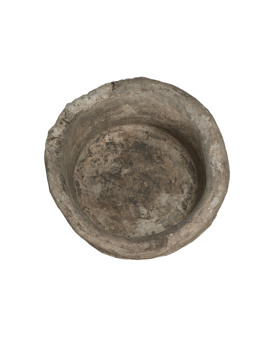 Vintage Indonesian limestone trough, top view shows weathered interior with natural stone texture.