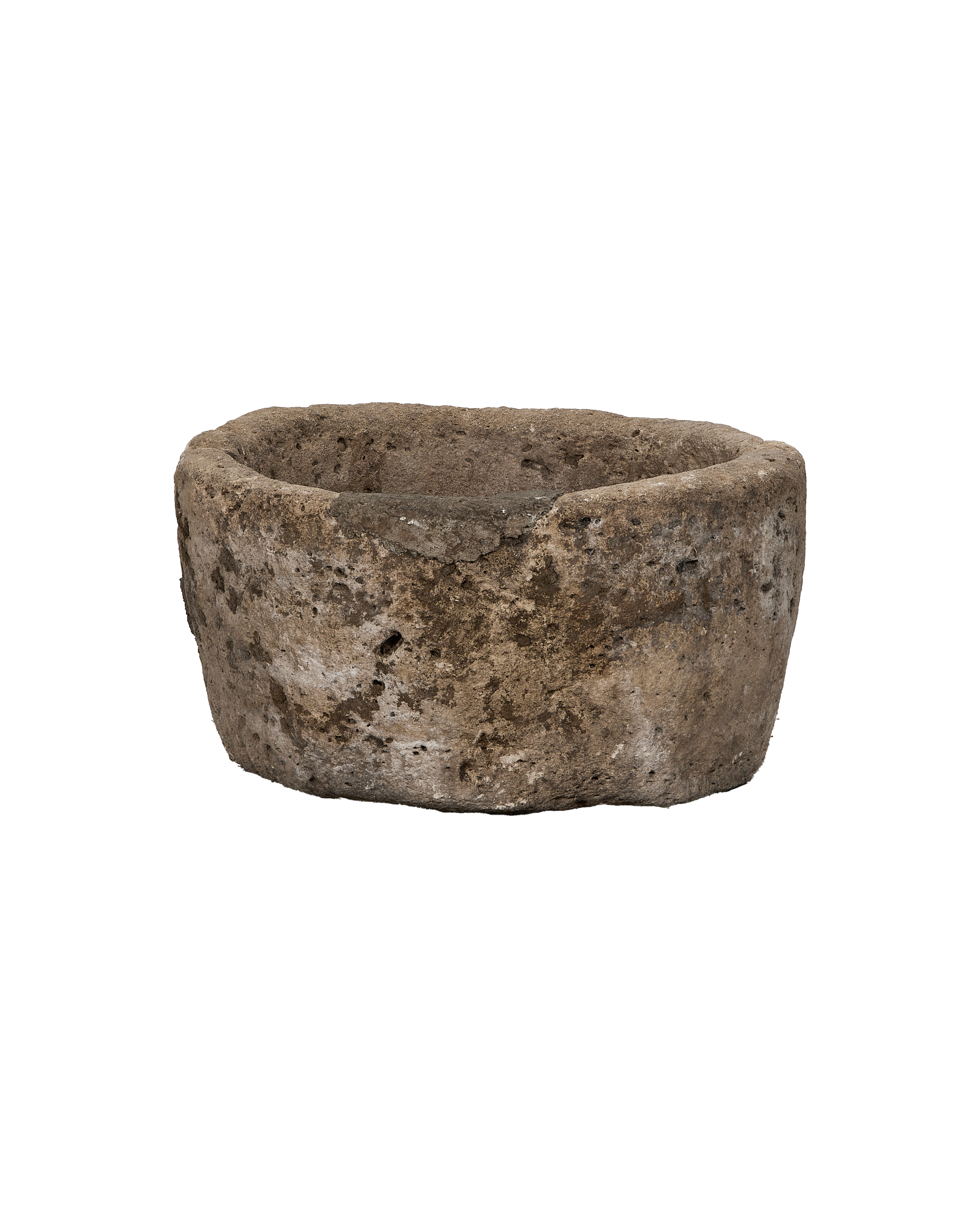 Vintage round limestone trough, OAK from Indonesia, with weathered, textured surface on black.