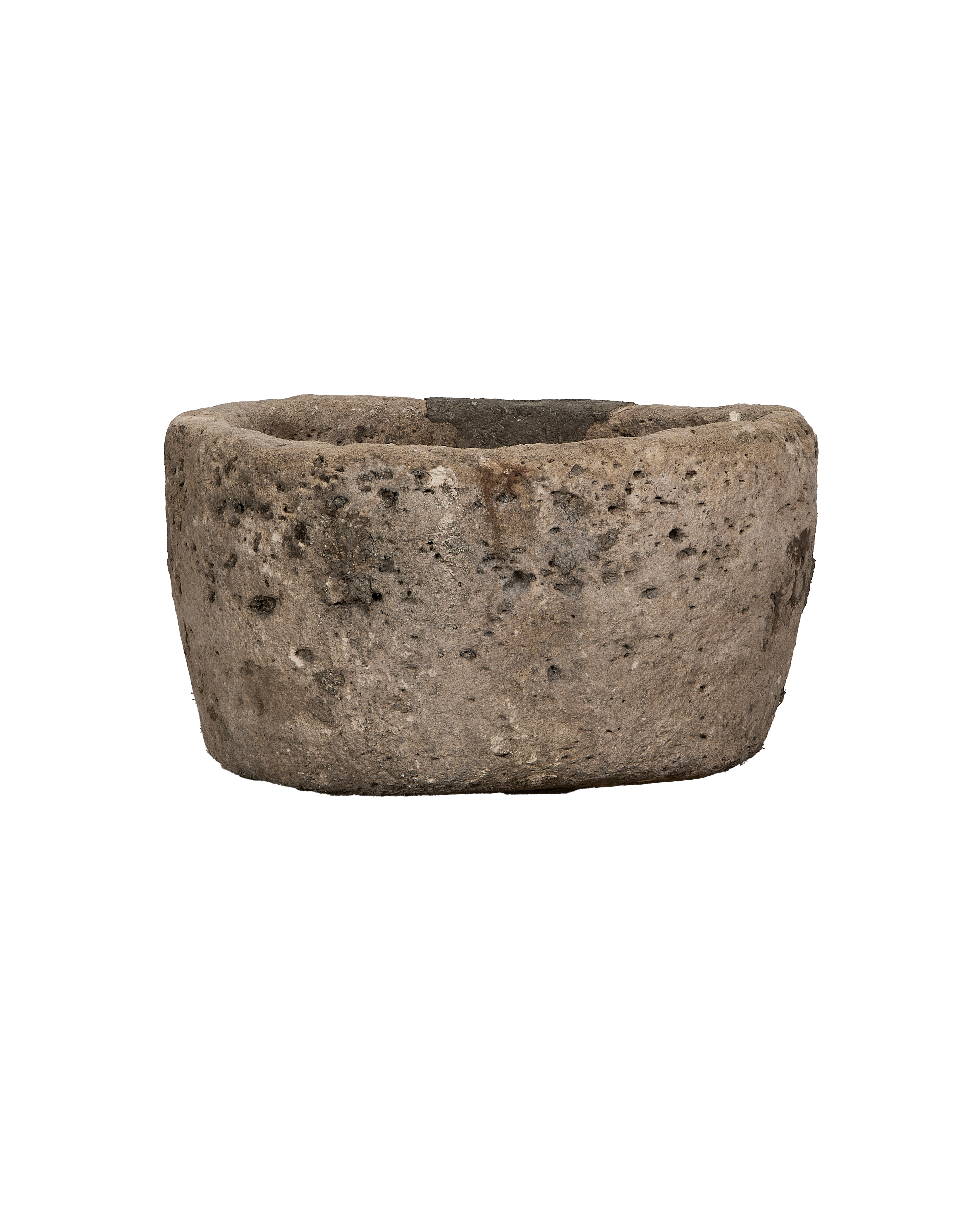 Vintage Indonesian limestone trough, OAK style, showing weathered texture and round form.