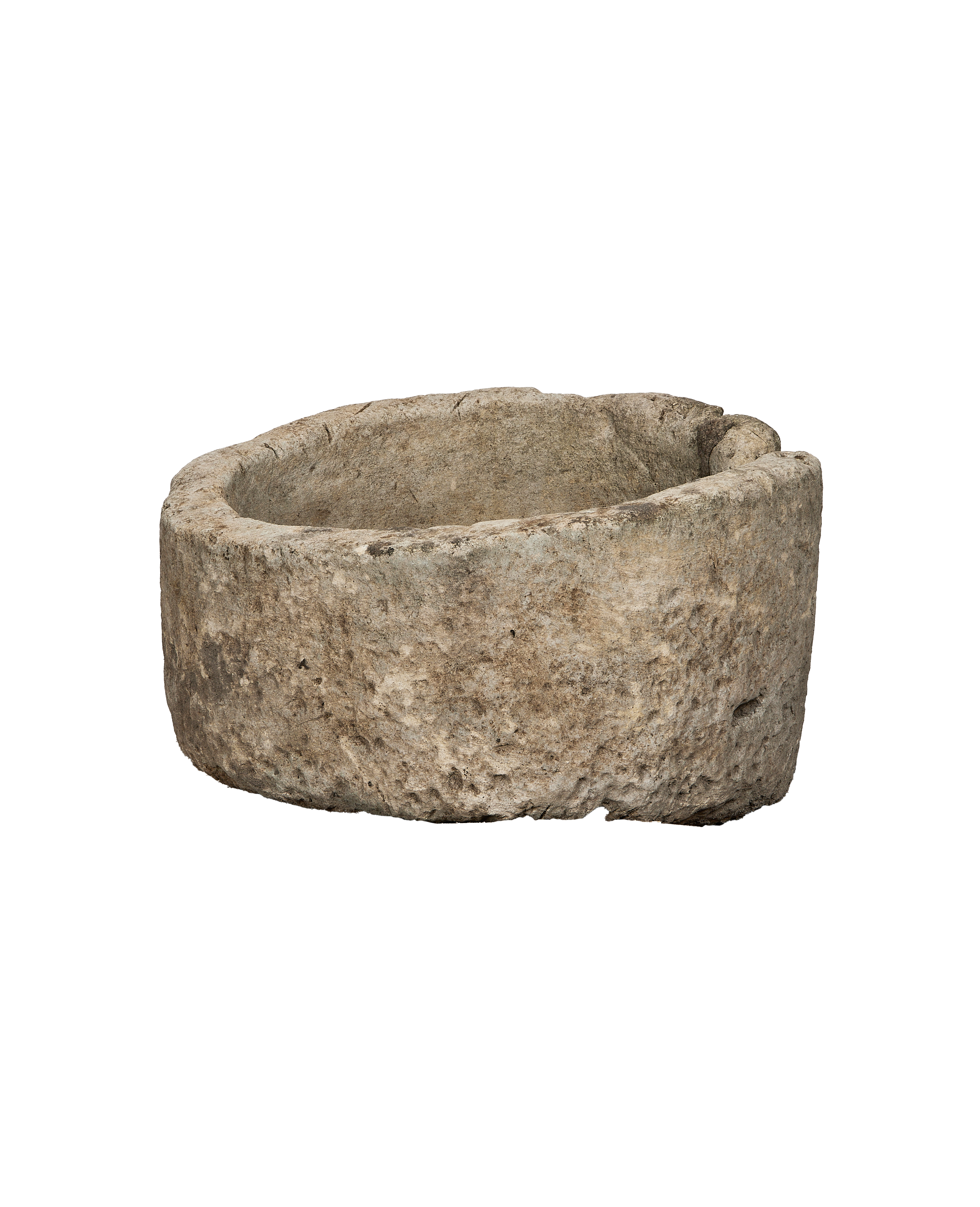 Vintage Indonesian round limestone trough, rich with natural texture and weathered patinas.