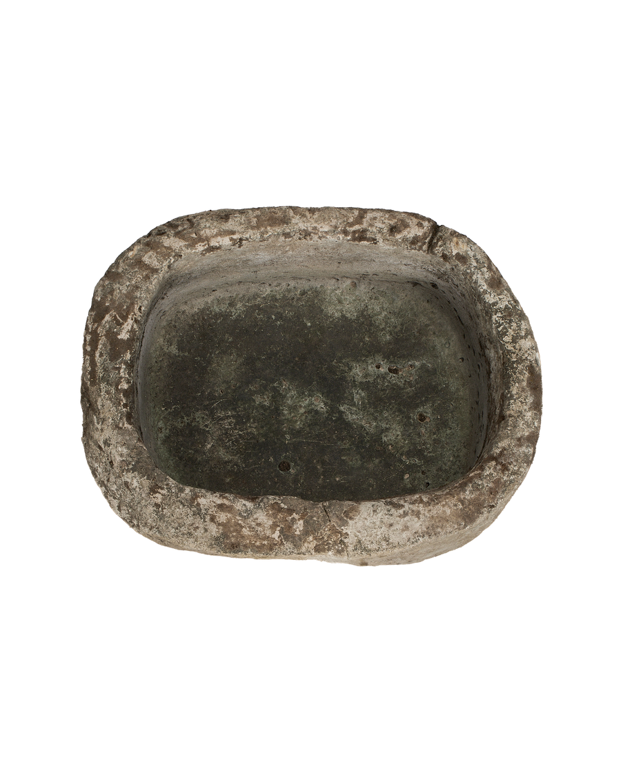 Vintage Indonesian limestone trough bird's-eye view, showing weathered gray-green interior patina.