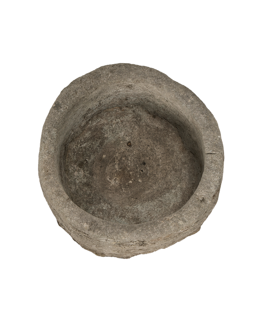 Vintage round Indonesian limestone trough, OAK style, showing interior basin and texture.